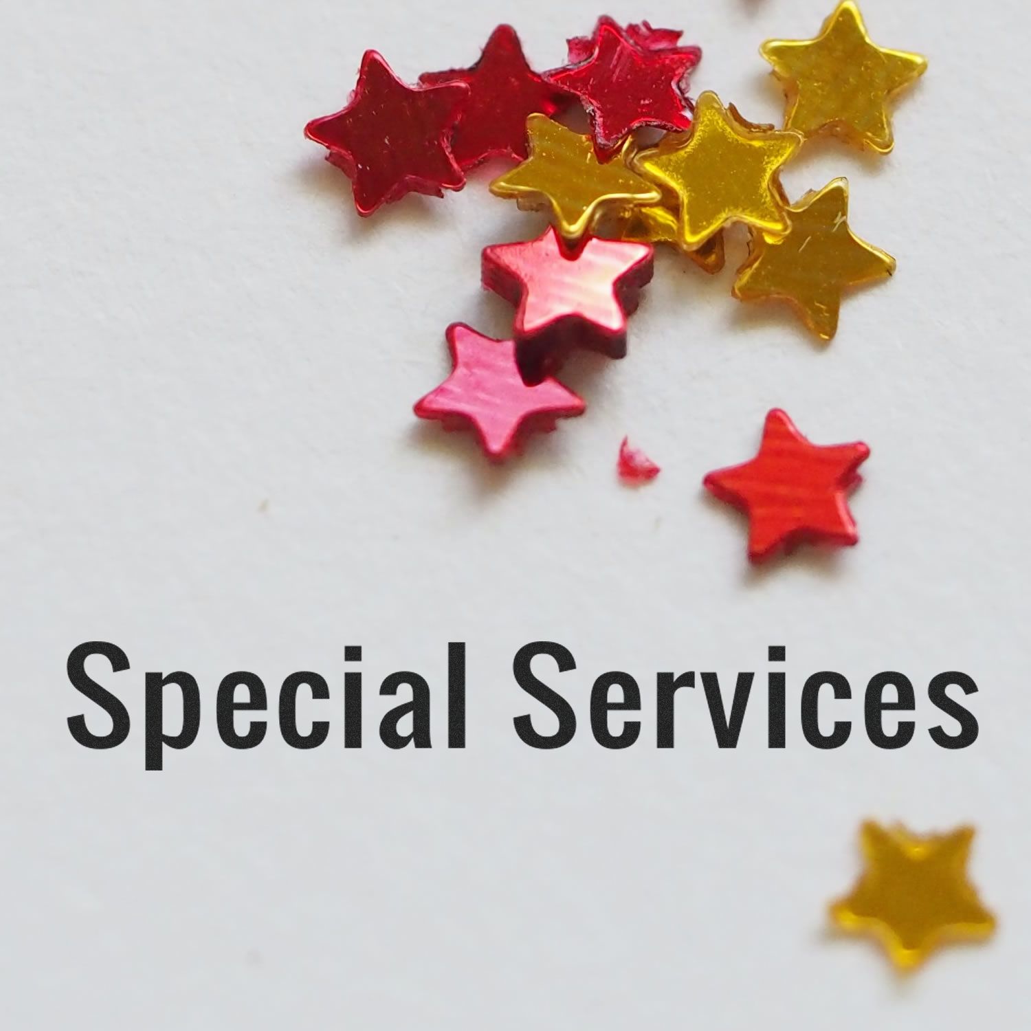 Special Services Rubber Stamp with red and gold star confetti on a white background.