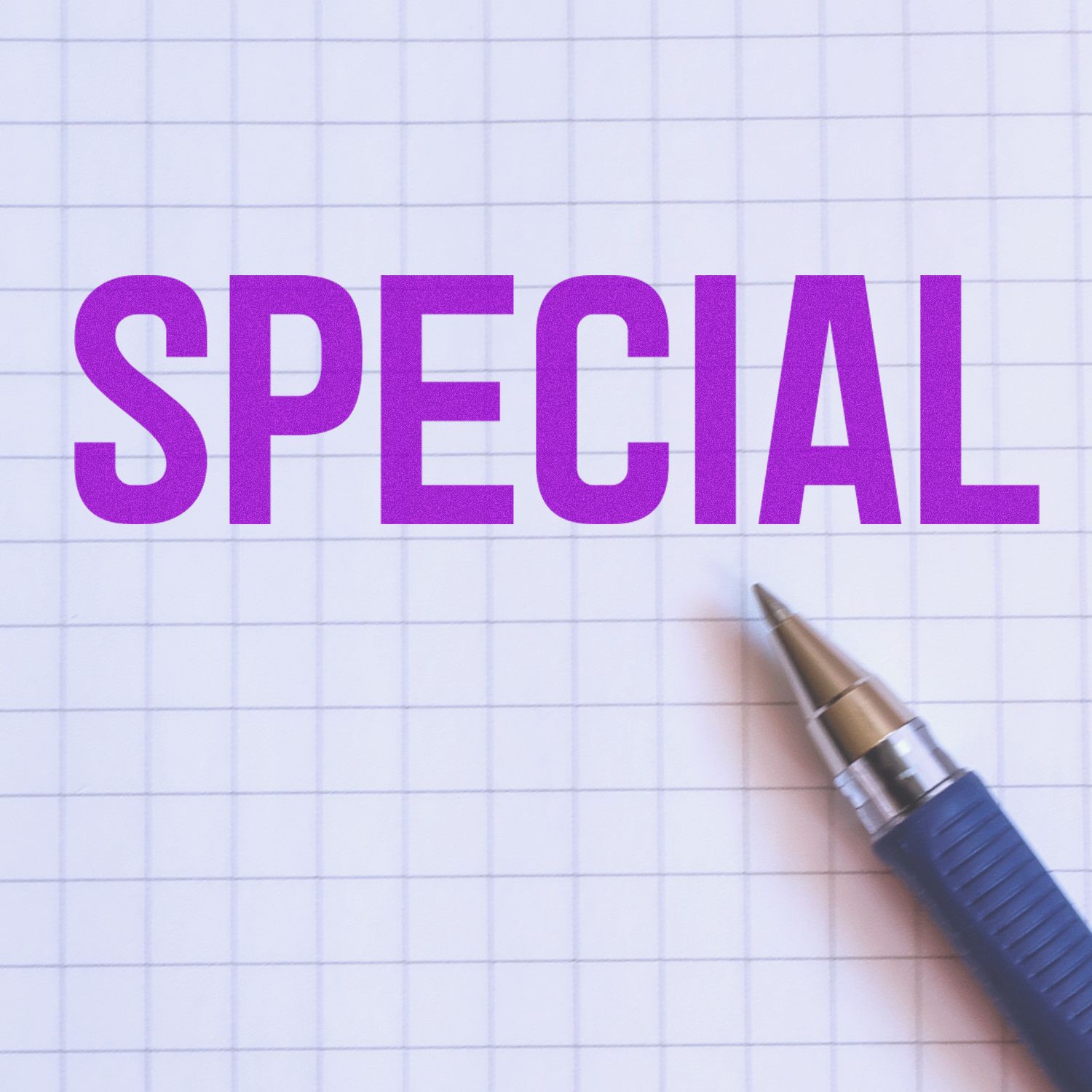 The image shows the word SPECIAL stamped in purple on graph paper, next to a blue pen, using the Large Self Inking Special Stamp.