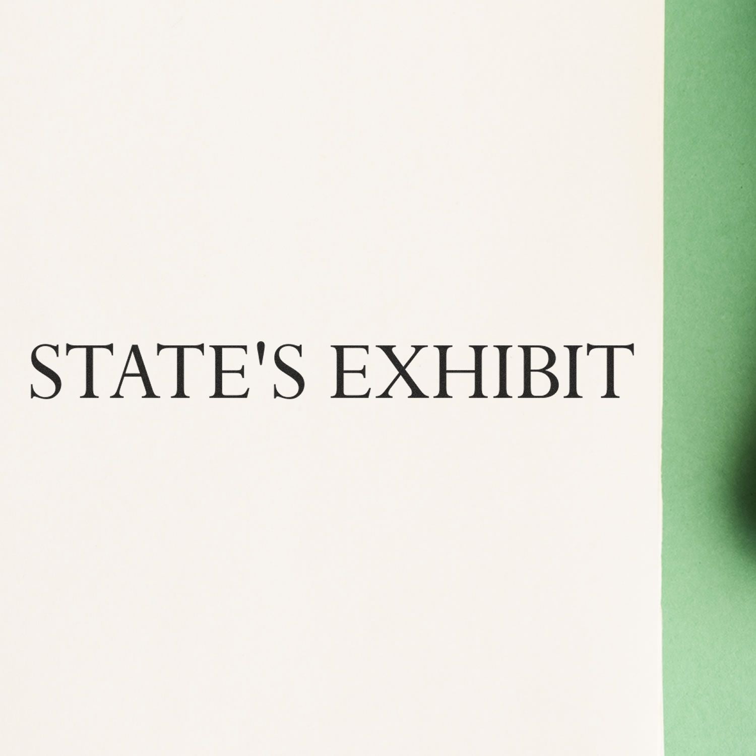 Large States Exhibit Rubber Stamp imprint on a white paper, partially shown with a green background on the right side.