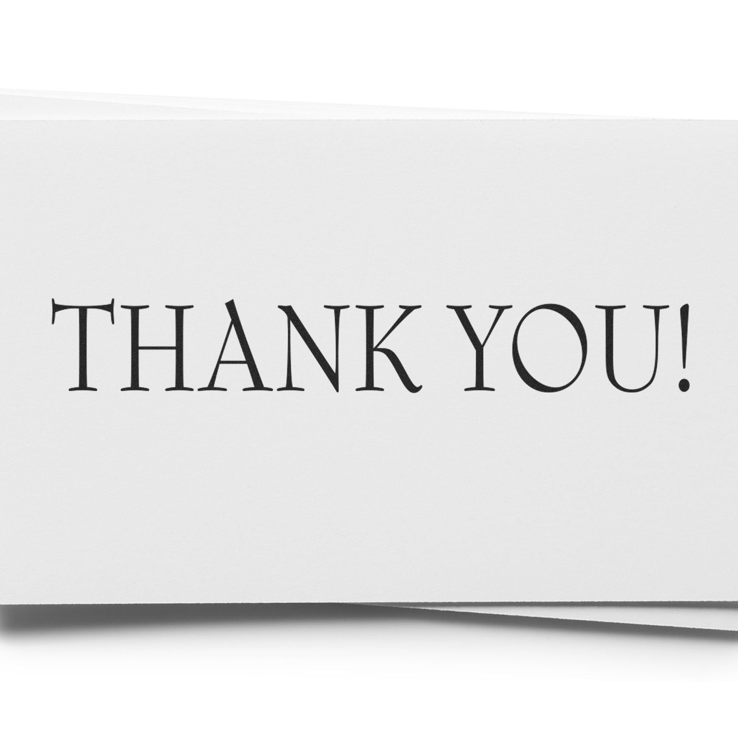 Thank You Rubber Stamp impression on white paper with bold, black letters spelling 'THANK YOU!'