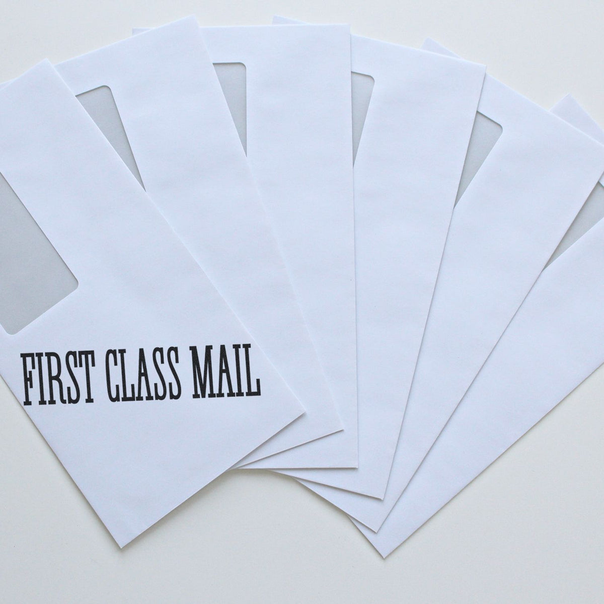 Slim Pre-Inked Times First Class Mail Stamp Lifestyle Photo