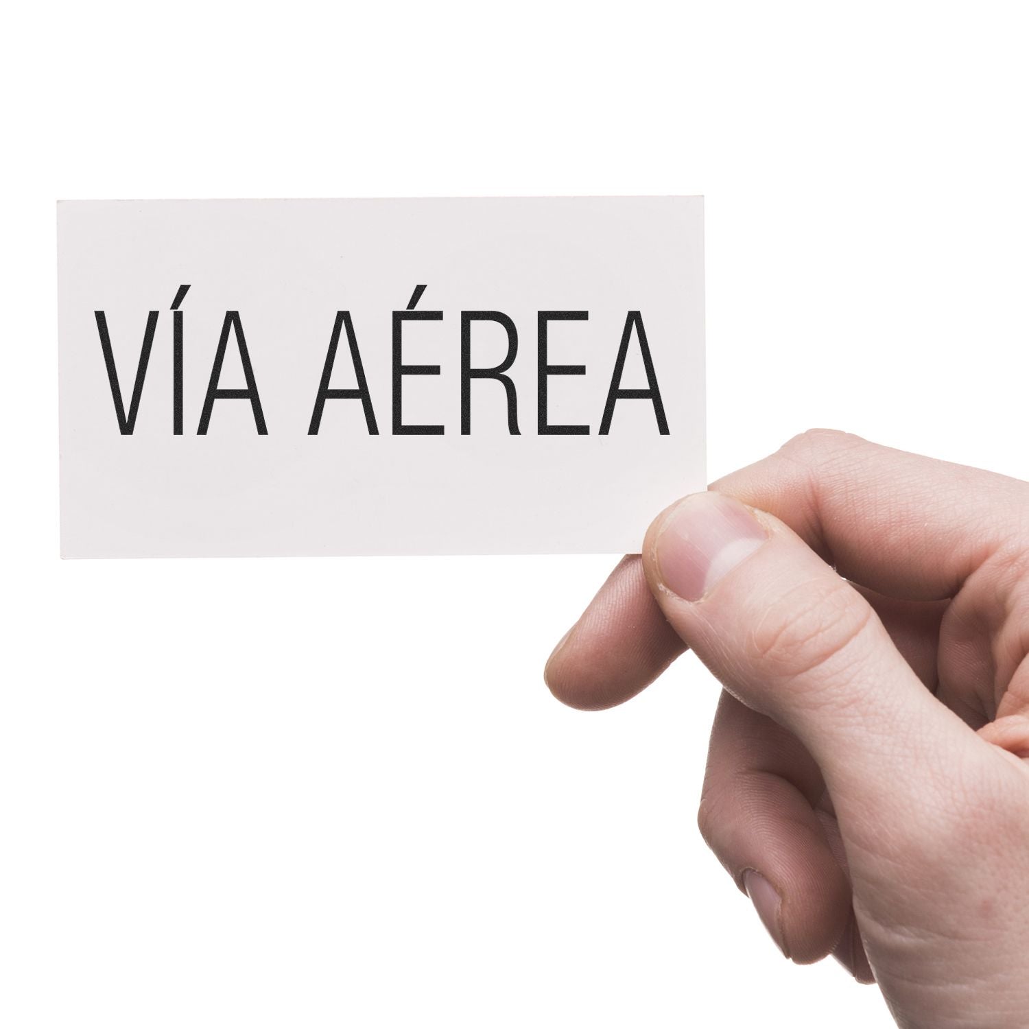 Hand holding a card stamped with "VÍA AÉREA" using the Large Via Aerea Rubber Stamp.