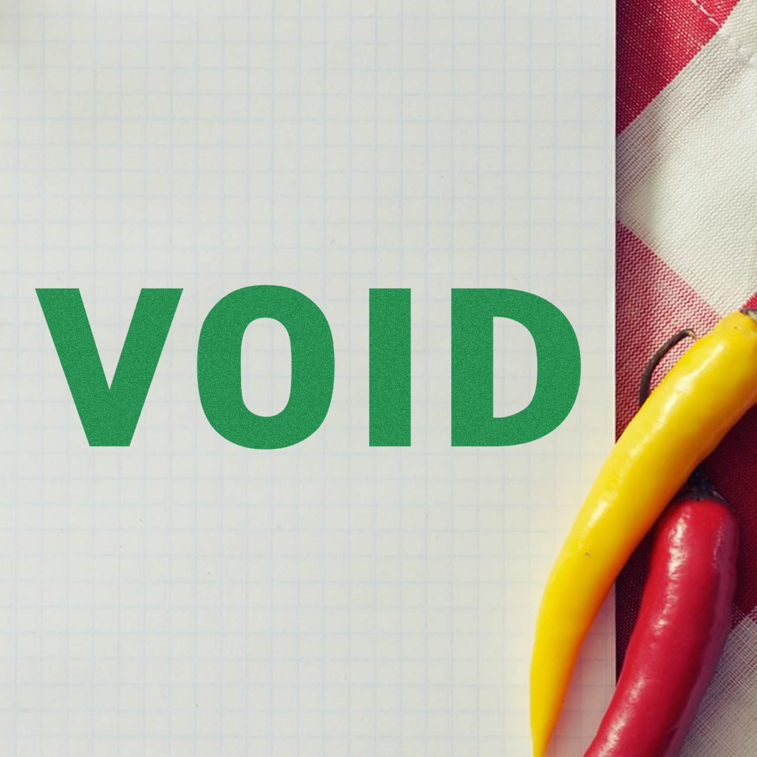 Large Pre-Inked Void Stamp marking VOID in green on graph paper, with yellow and red chili peppers on the side.