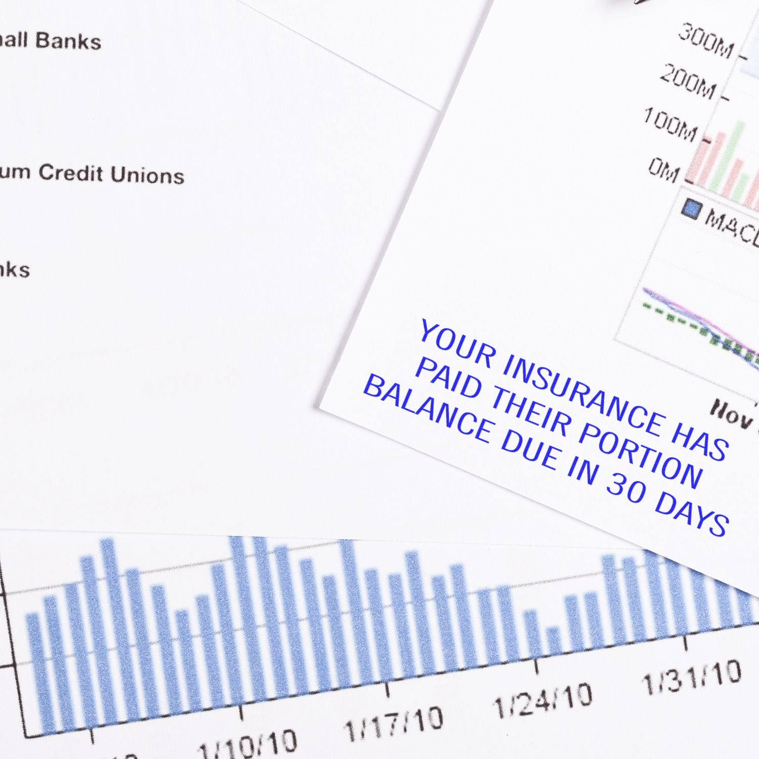 Slim Pre-Inked Your Insurance Has Paid Their Portion Stamp on a financial document with graphs and charts in the background.