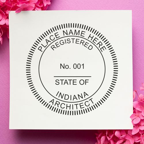 A lifestyle photo showing a stamped image of the Slim Pre-Inked Indiana Architect Seal Stamp on a piece of paper