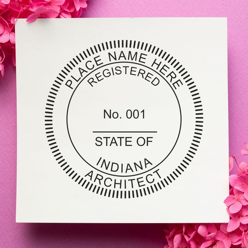 Premium MaxLight Pre-Inked Indiana Architectural Stamp on a pink background with flowers, displaying a customizable architect seal.