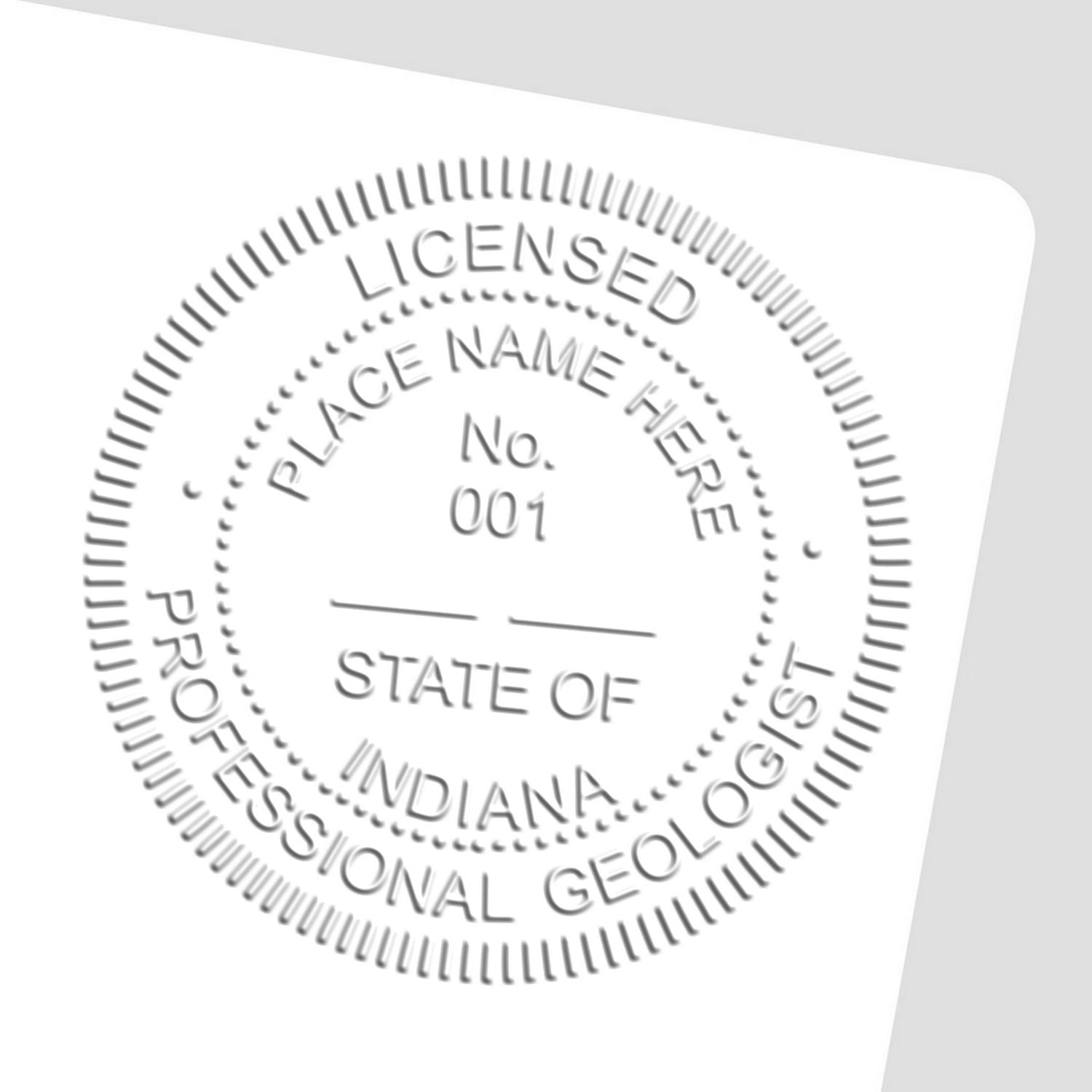 An alternative view of the Handheld Indiana Professional Geologist Embosser stamped on a sheet of paper showing the image in use