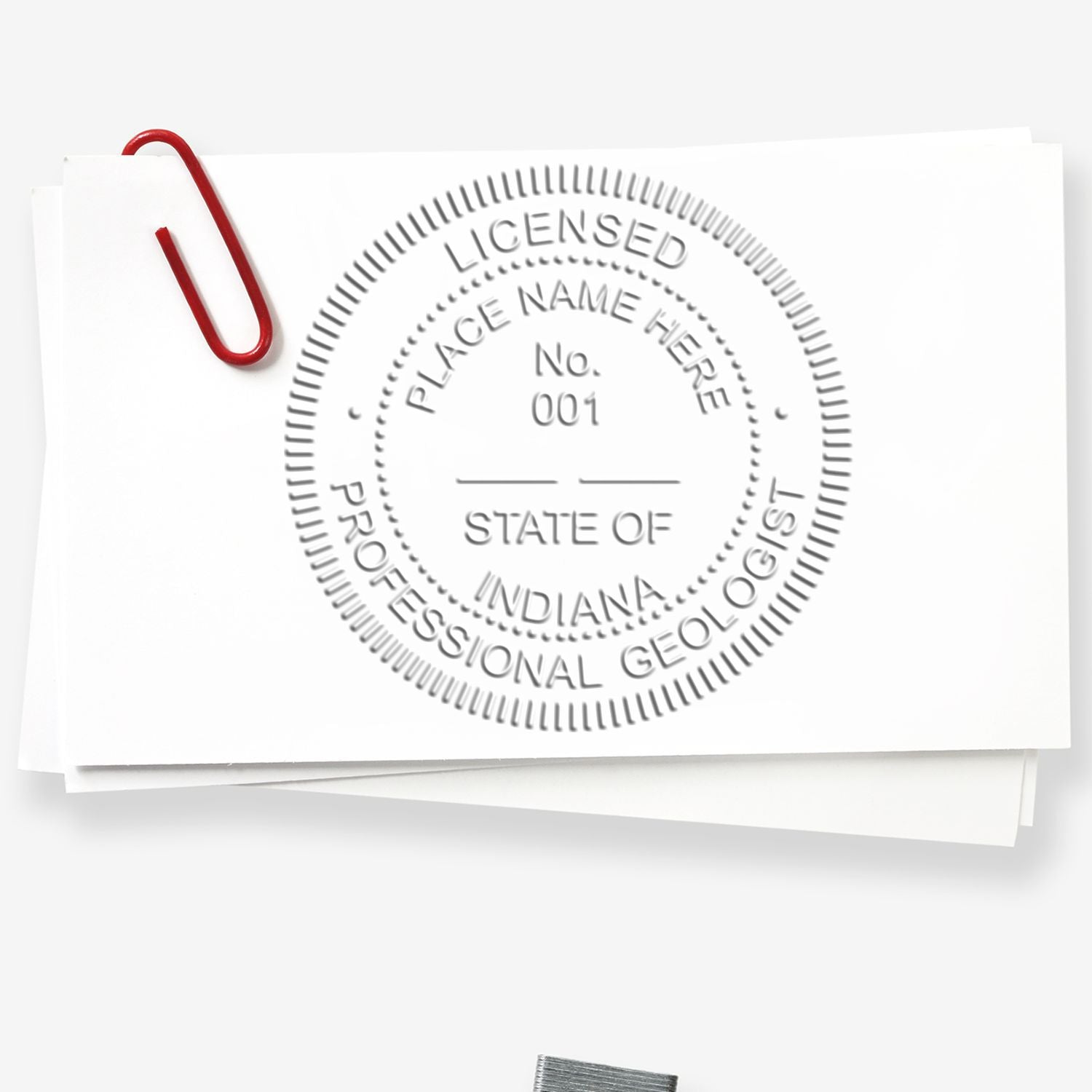 An in use photo of the Gift Indiana Geologist Seal showing a sample imprint on a cardstock