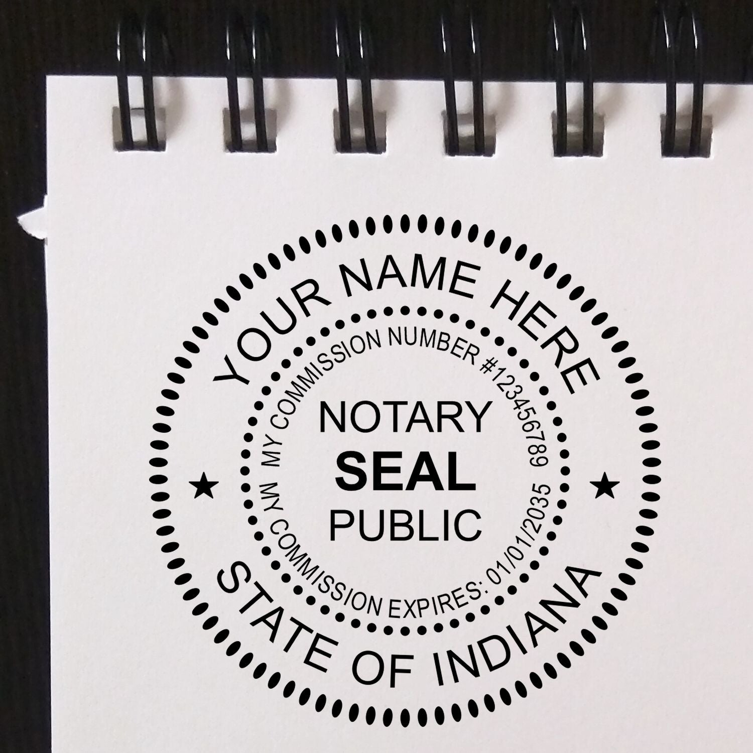 A lifestyle photo showing a stamped image of the Round Indiana Notary Public Seal Stamp on a piece of paper