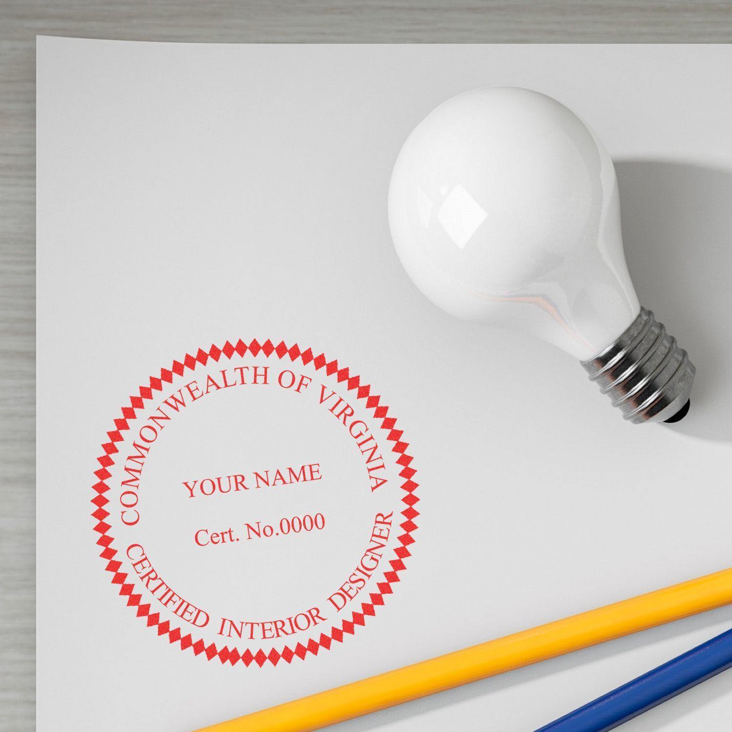 Interior Designer Regular Rubber Stamp of Seal imprint on paper with a light bulb and pencils nearby.