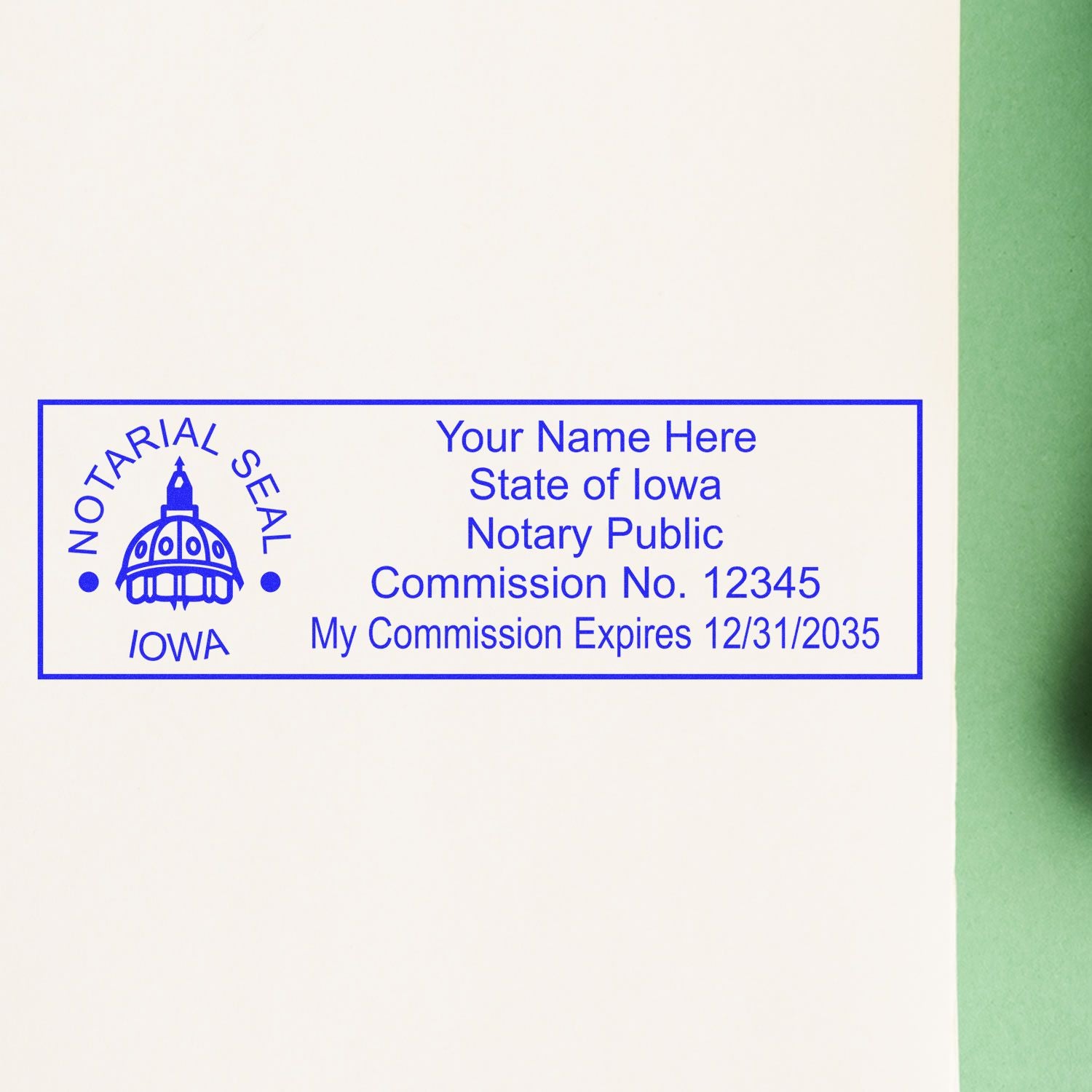 A lifestyle photo showing a stamped image of the Iowa Rectangular Digital Notary Seal on a piece of paper