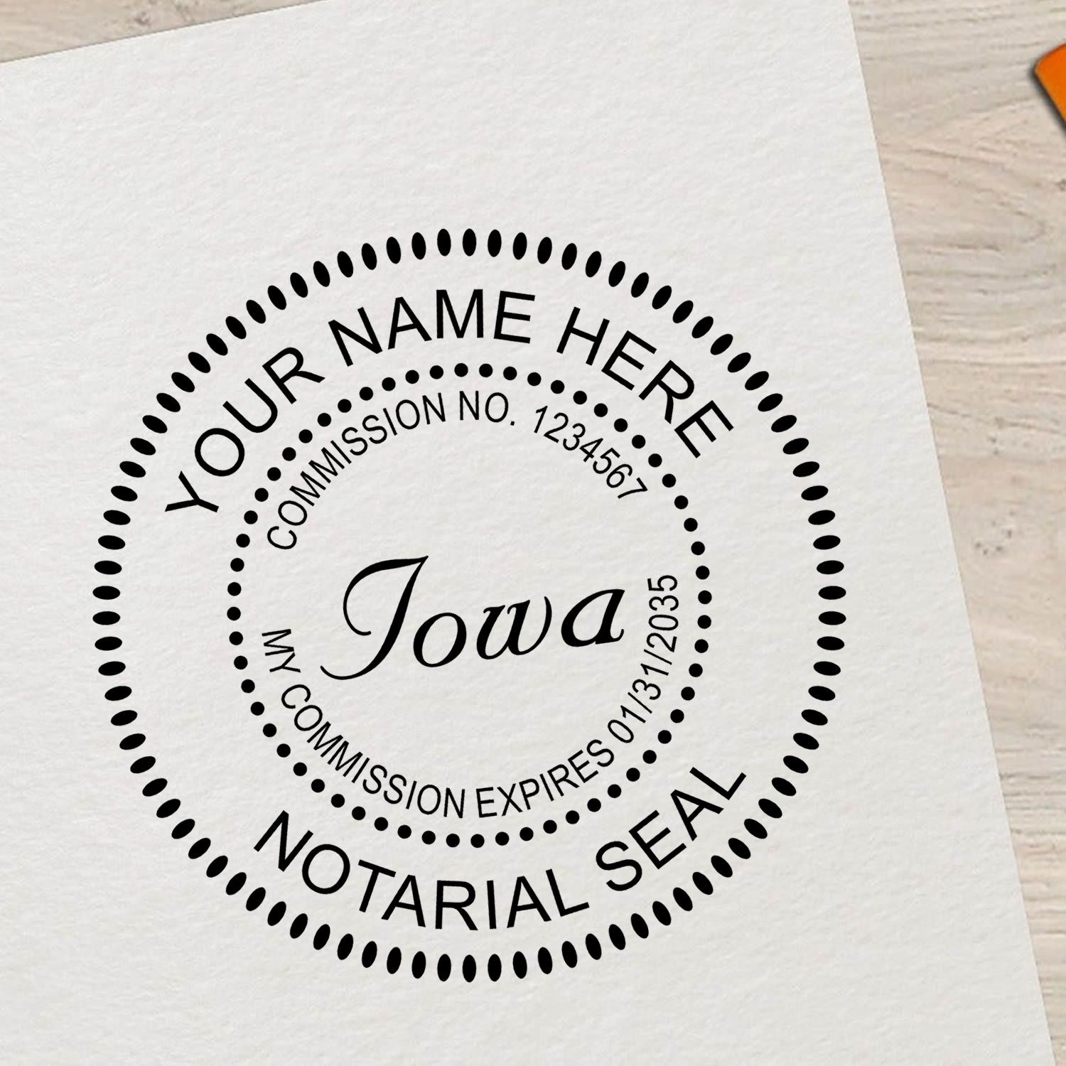 This paper is stamped with a sample imprint of the Official Self-Inking Iowa Notary Stamp, signifying its quality and reliability.