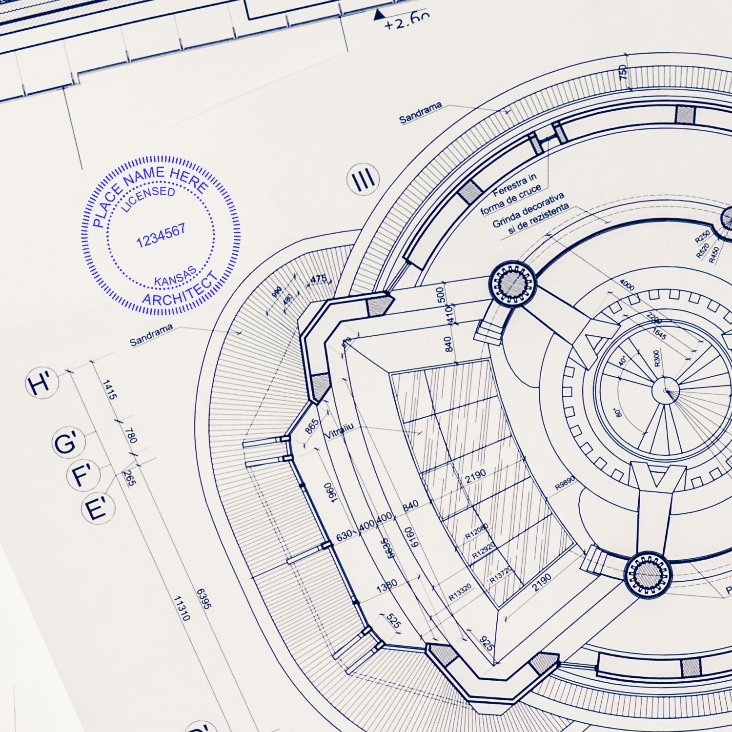 Architectural blueprint stamped with the Premium MaxLight Pre-Inked Kansas Architectural Stamp in blue ink, showing detailed building plans.