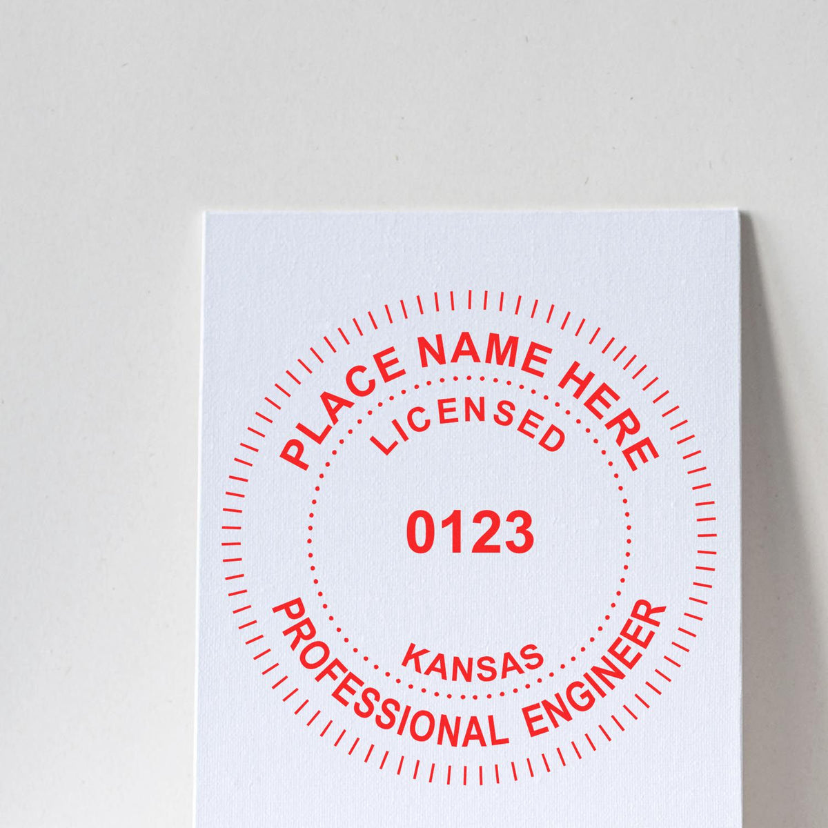 A photograph of the Slim Pre-Inked Kansas Professional Engineer Seal Stamp stamp impression reveals a vivid, professional image of the on paper.