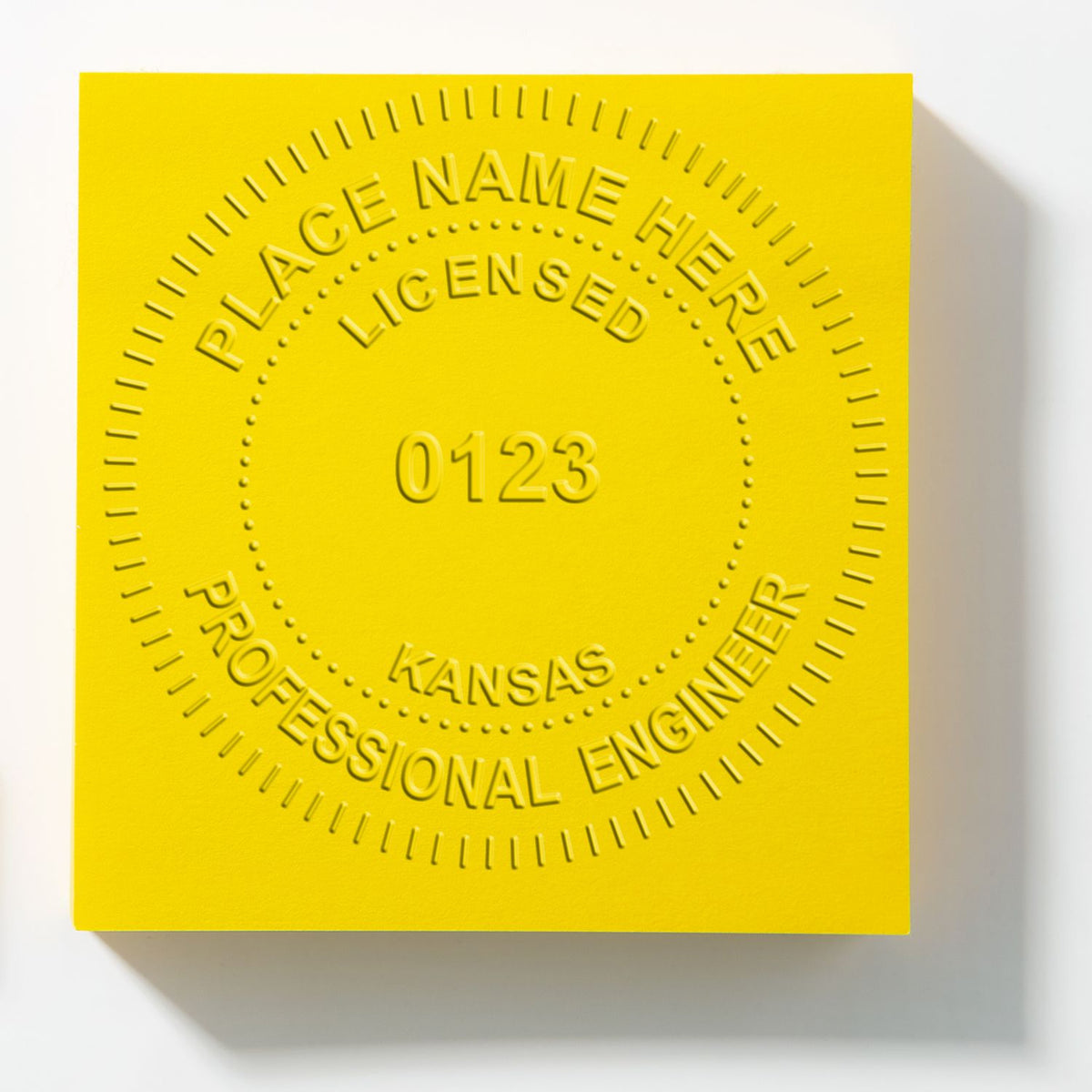 A photograph of the Heavy Duty Cast Iron Kansas Engineer Seal Embosser stamp impression reveals a vivid, professional image of the on paper.