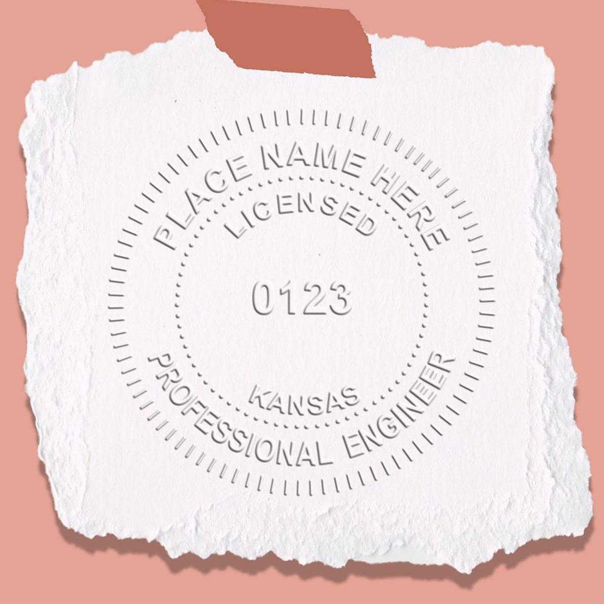 A lifestyle photo showing a stamped image of the Handheld Kansas Professional Engineer Embosser on a piece of paper