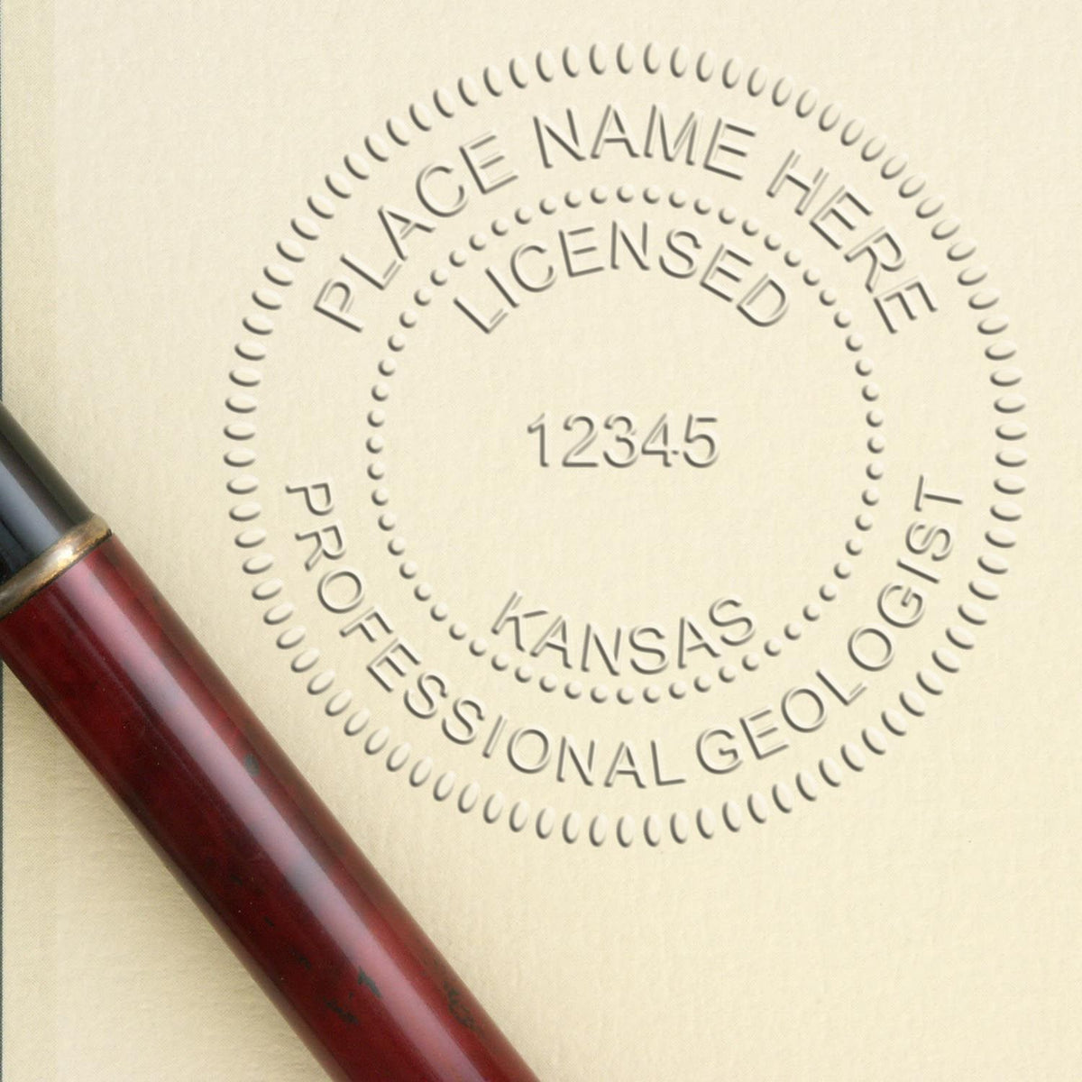 An in use photo of the Kansas Geologist Desk Seal showing a sample imprint on a cardstock