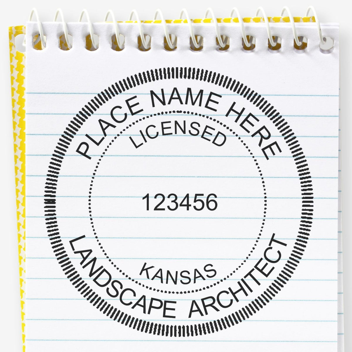 This paper is stamped with a sample imprint of the Premium MaxLight Pre-Inked Kansas Landscape Architectural Stamp, signifying its quality and reliability.