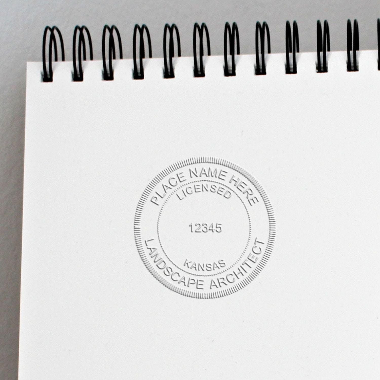 The Kansas Long Reach Landscape Architect Embossing Stamp stamp impression comes to life with a crisp, detailed photo on paper - showcasing true professional quality.