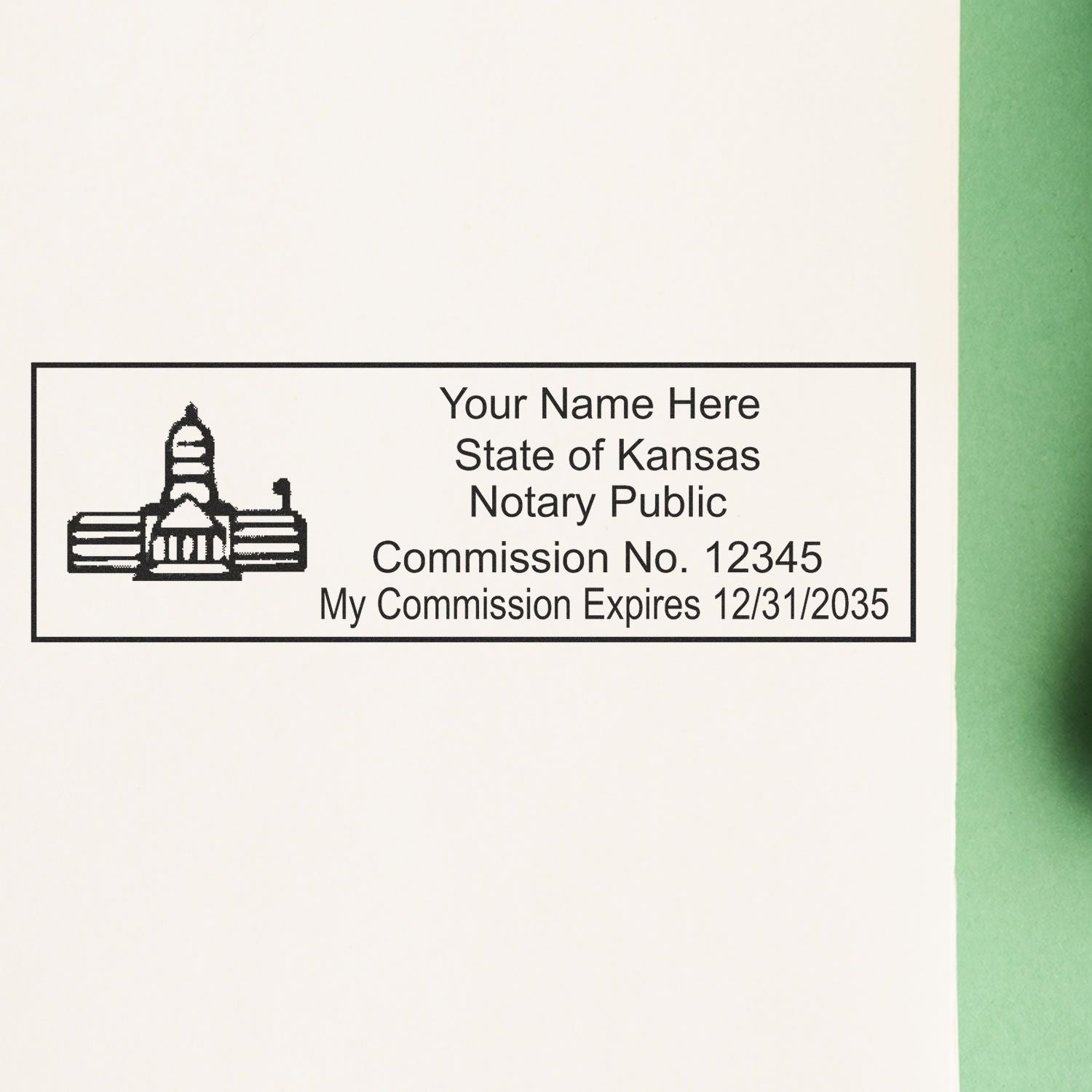 The main image for the Heavy-Duty Kansas Rectangular Notary Stamp depicting a sample of the imprint and electronic files