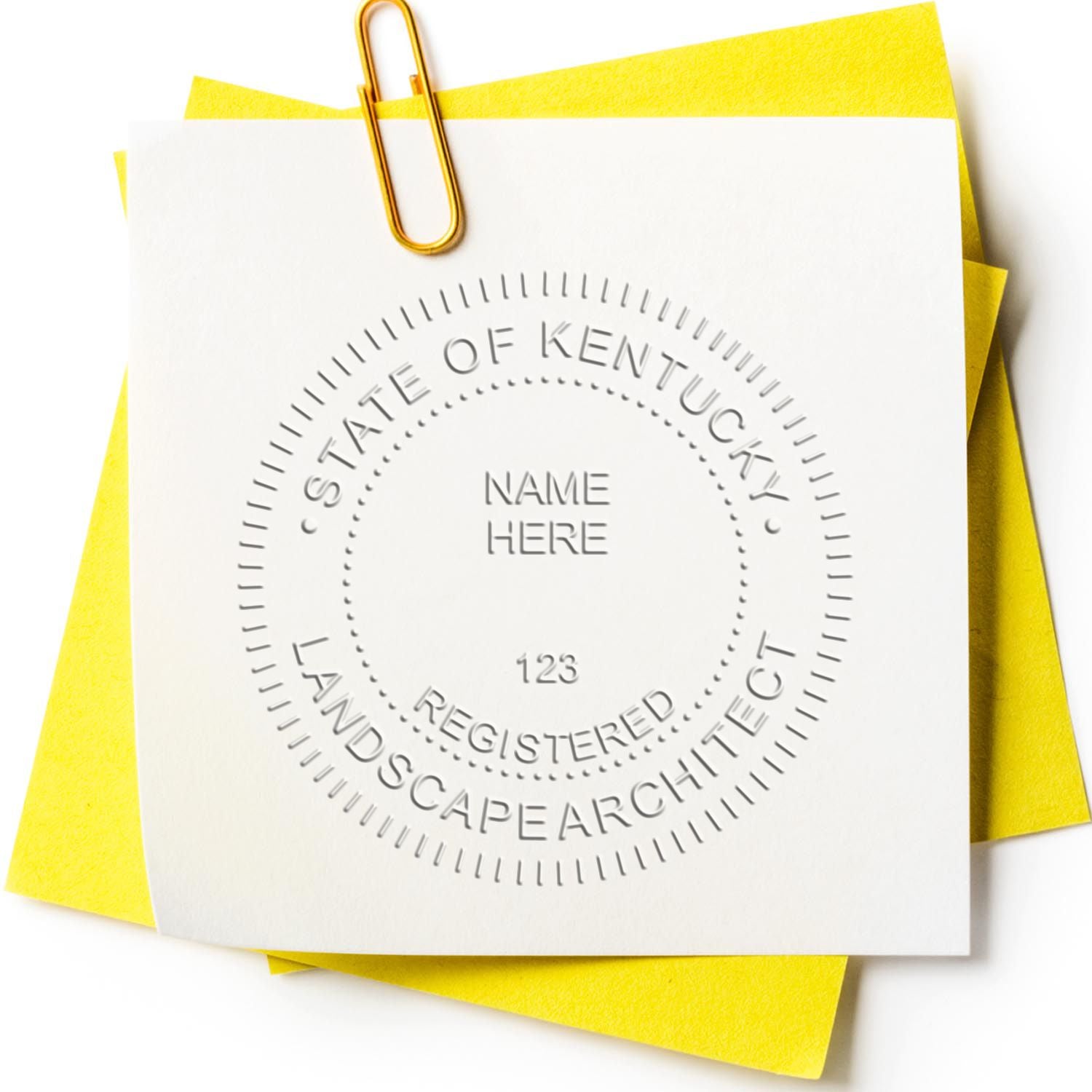 A stamped impression of the State of Kentucky Handheld Landscape Architect Seal in this stylish lifestyle photo, setting the tone for a unique and personalized product.