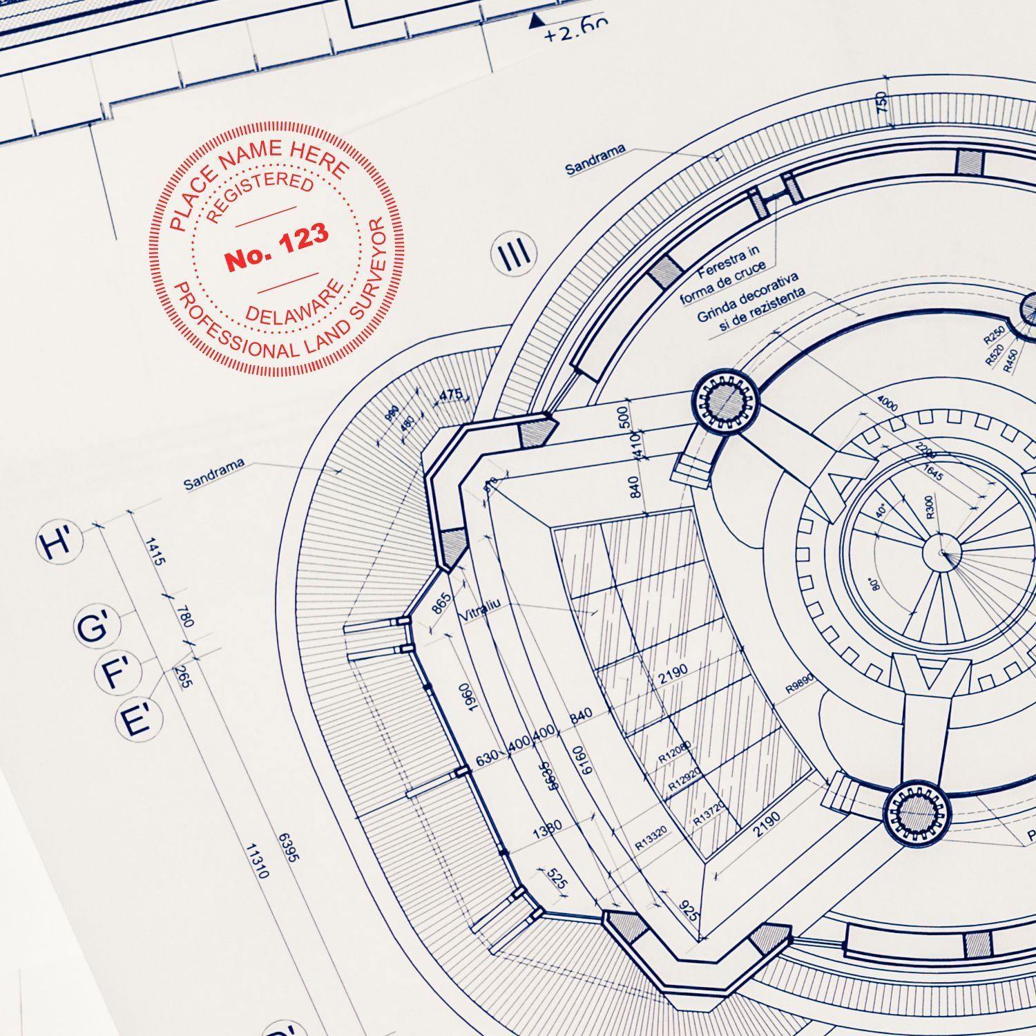 Blueprint with a red Land Surveyor Regular Rubber Stamp of Seal marked on it, showing detailed architectural design and measurements.