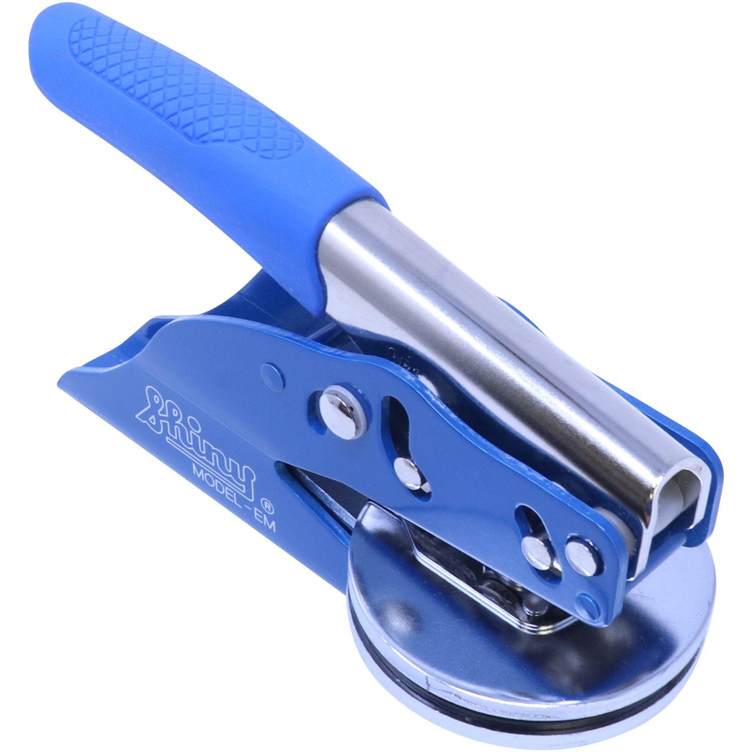 Forester Blue Soft Seal Embosser with a blue handle and metal components, designed for creating embossed imprints.