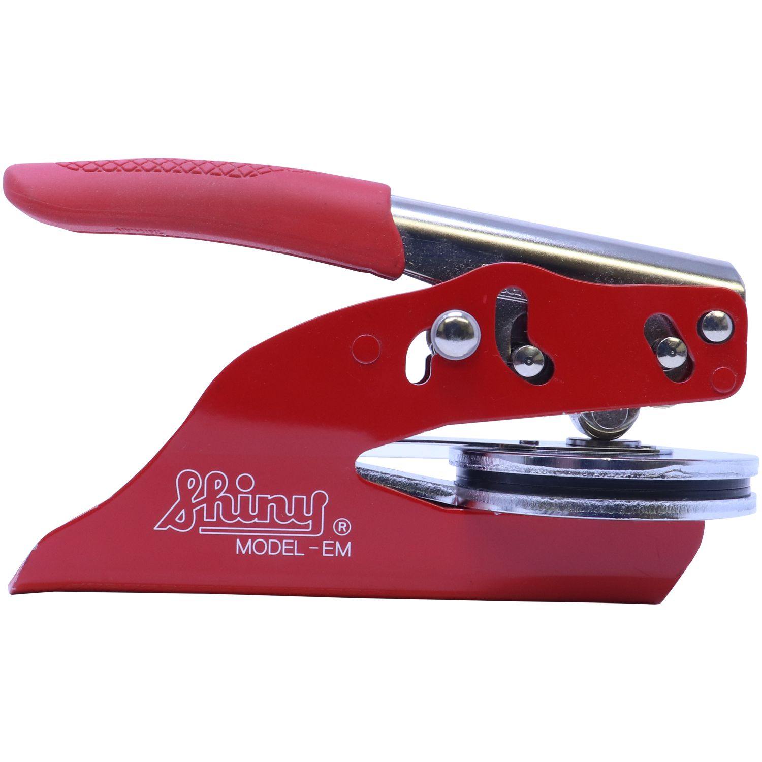 Forester Red Soft Seal Embosser with a red handle and metal components, designed for creating embossed imprints.