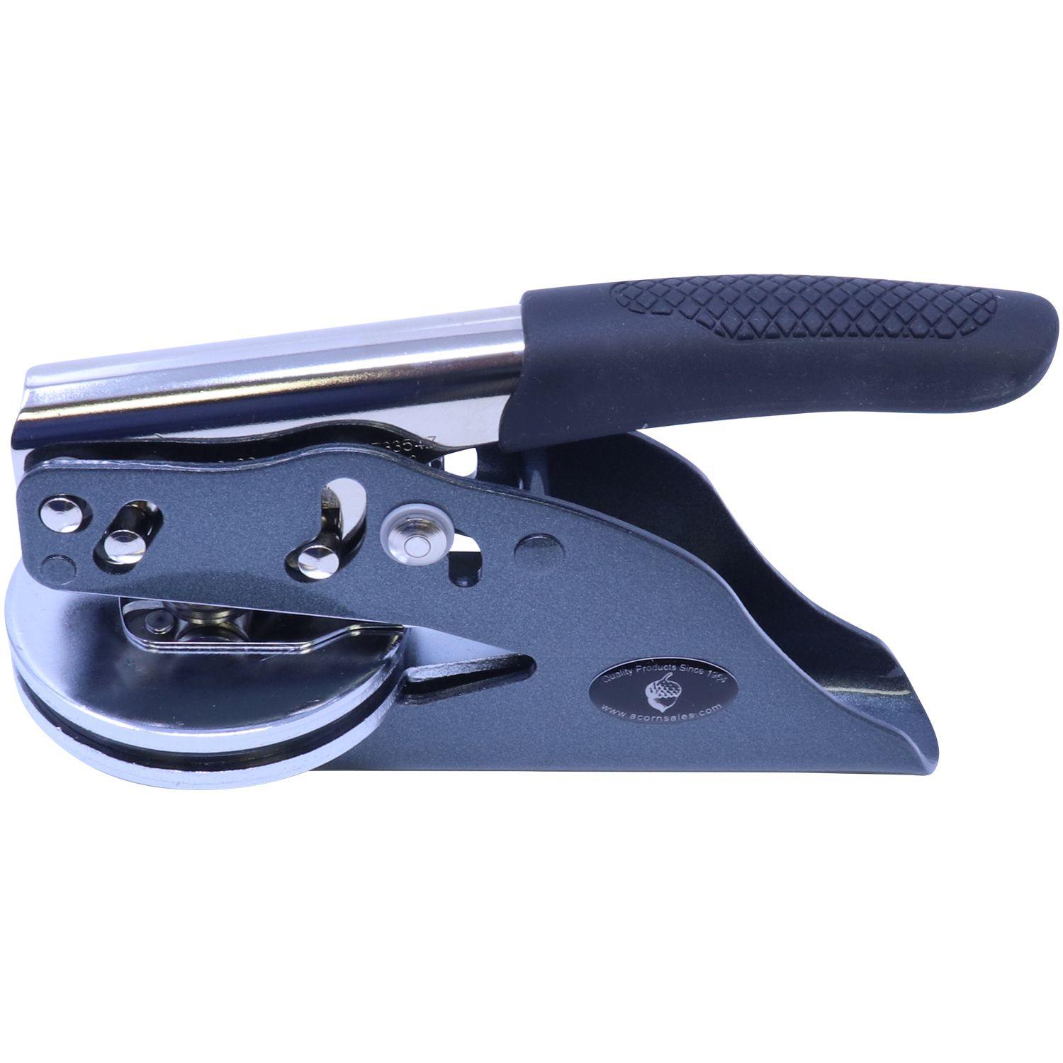 Image of the Architect Soft Handheld Seal Embosser, featuring a sleek black handle with a textured grip, and a sturdy metal body designed for creating precise embossed imprints.