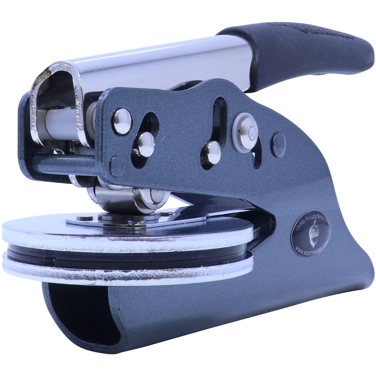 Close-up view of the Architect Soft Handheld Seal Embosser, featuring a sleek metal design with a comfortable black handle, shown from an angled perspective.