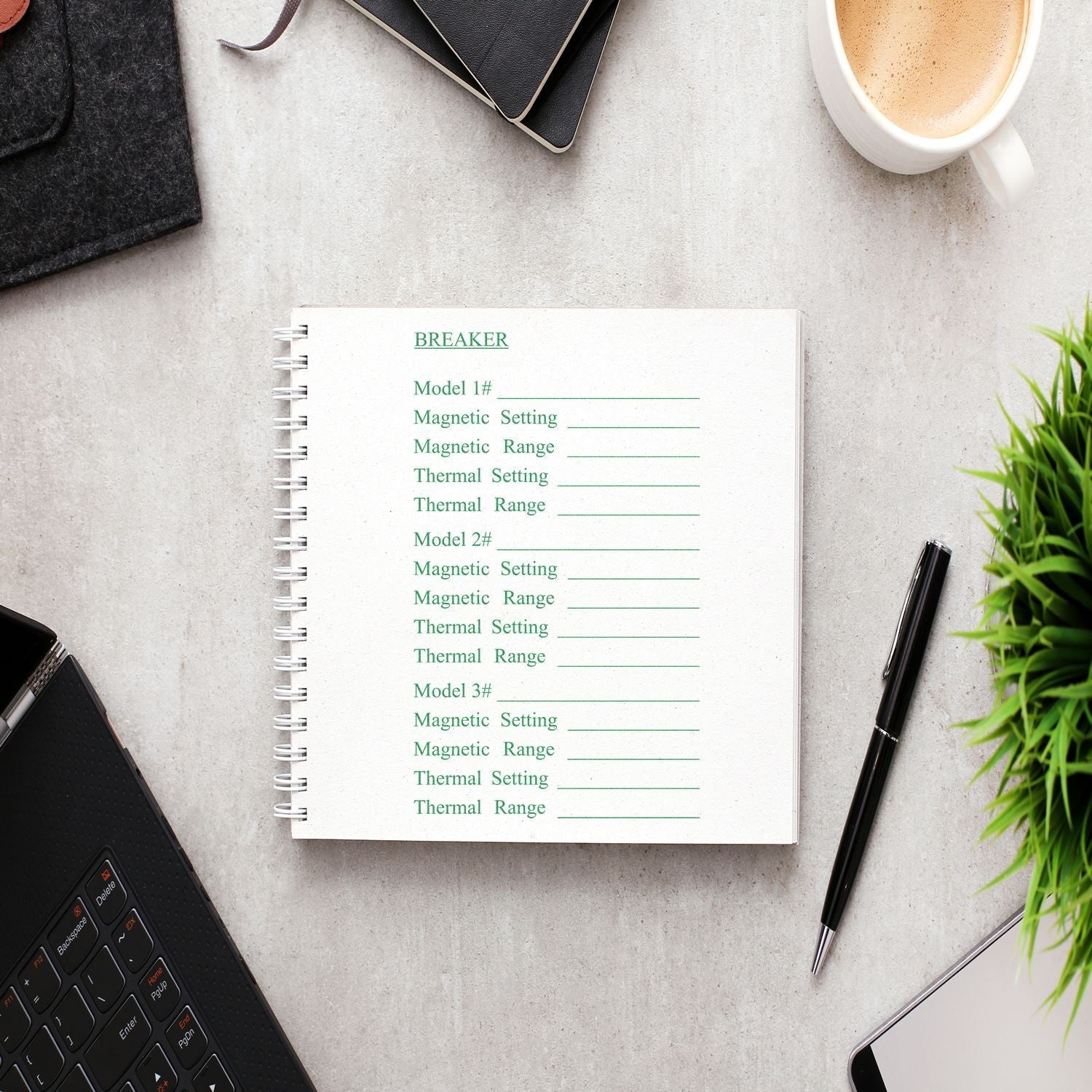 A 13 Line Custom Rubber Stamp with Wood Handle is used on a notebook page, surrounded by a pen, coffee cup, plant, and laptop.