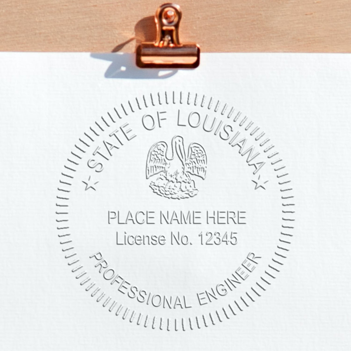 An alternative view of the Heavy Duty Cast Iron Louisiana Engineer Seal Embosser stamped on a sheet of paper showing the image in use