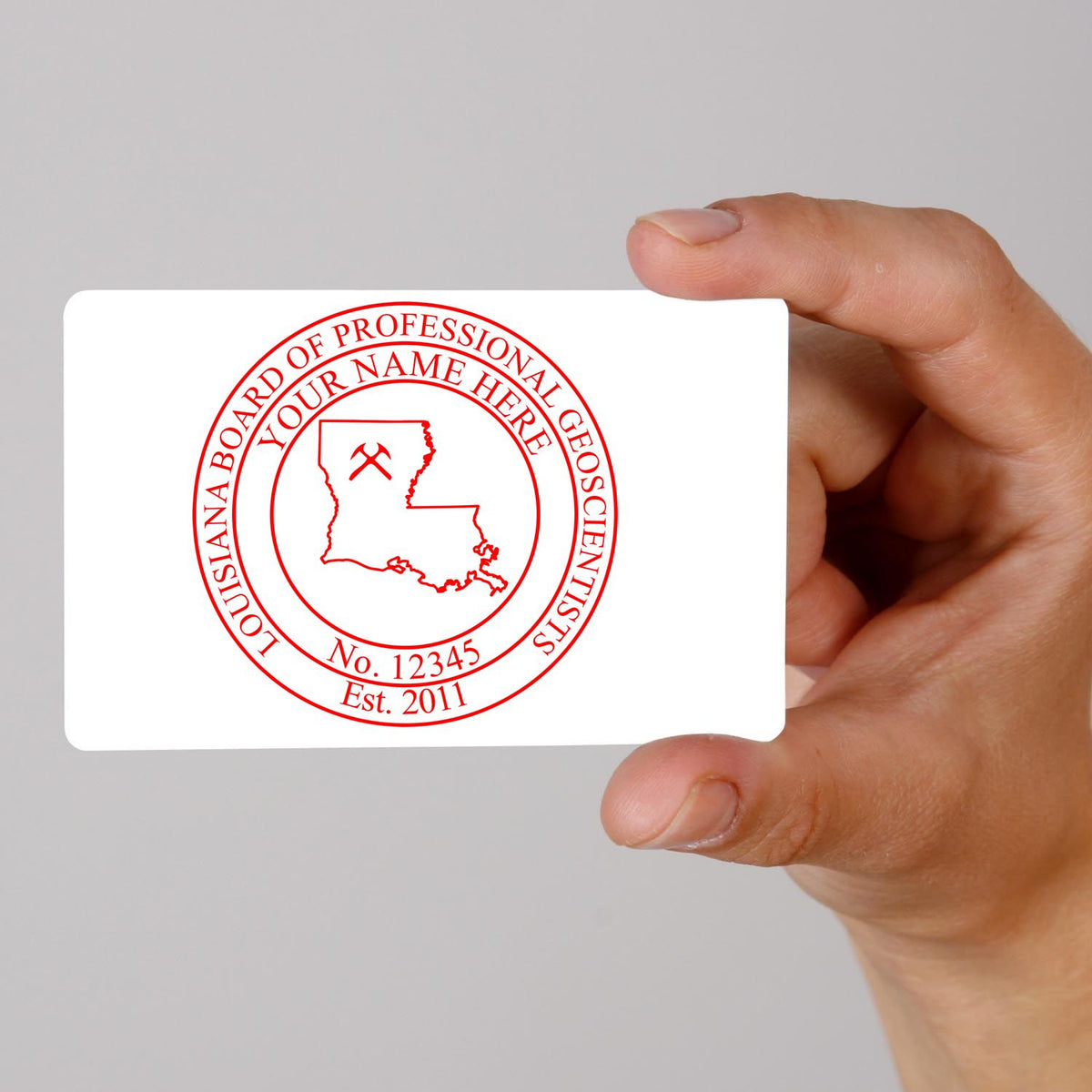 A lifestyle photo showing a stamped image of the Louisiana Professional Geologist Seal Stamp on a piece of paper