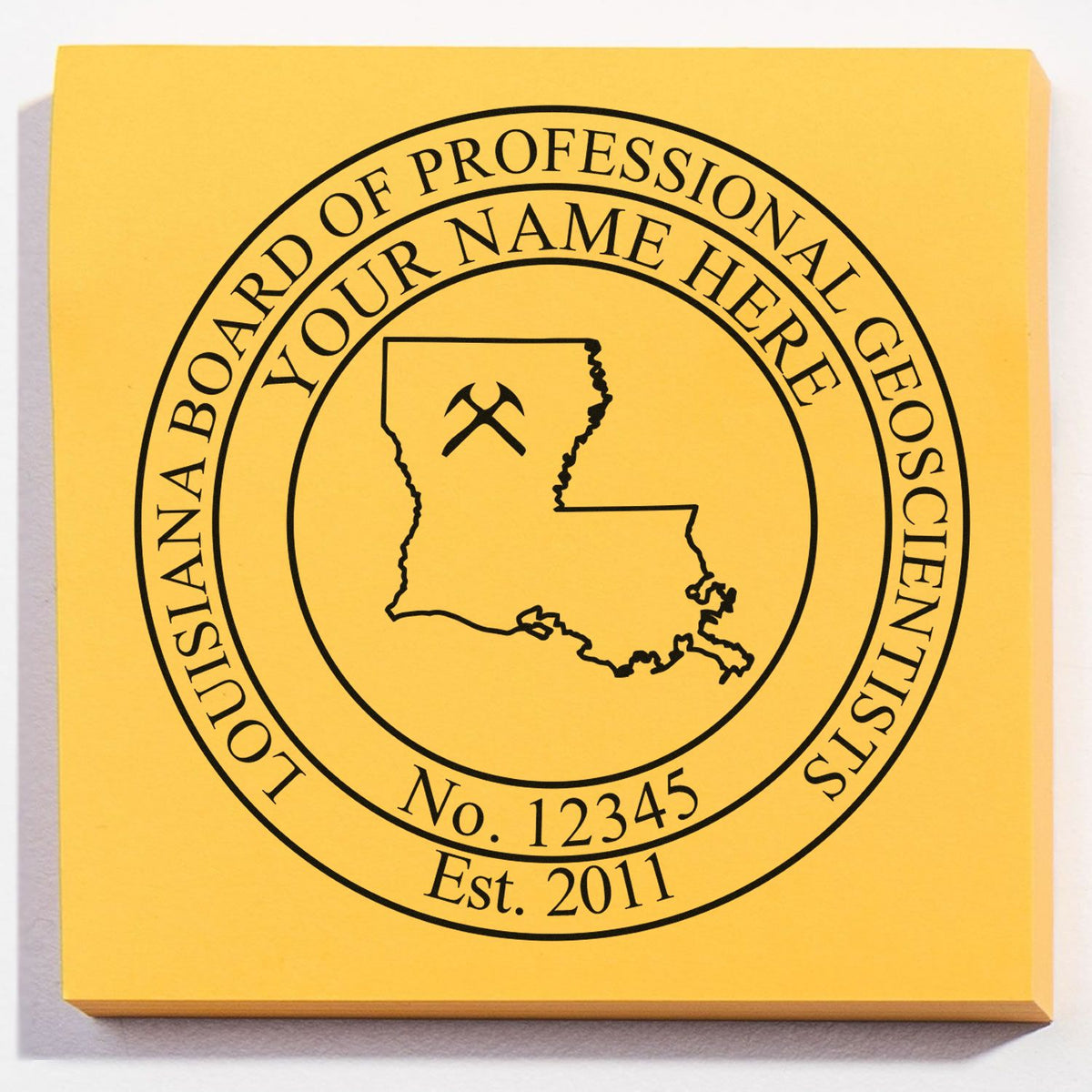 A lifestyle photo showing a stamped image of the Premium MaxLight Pre-Inked Louisiana Geology Stamp on a piece of paper