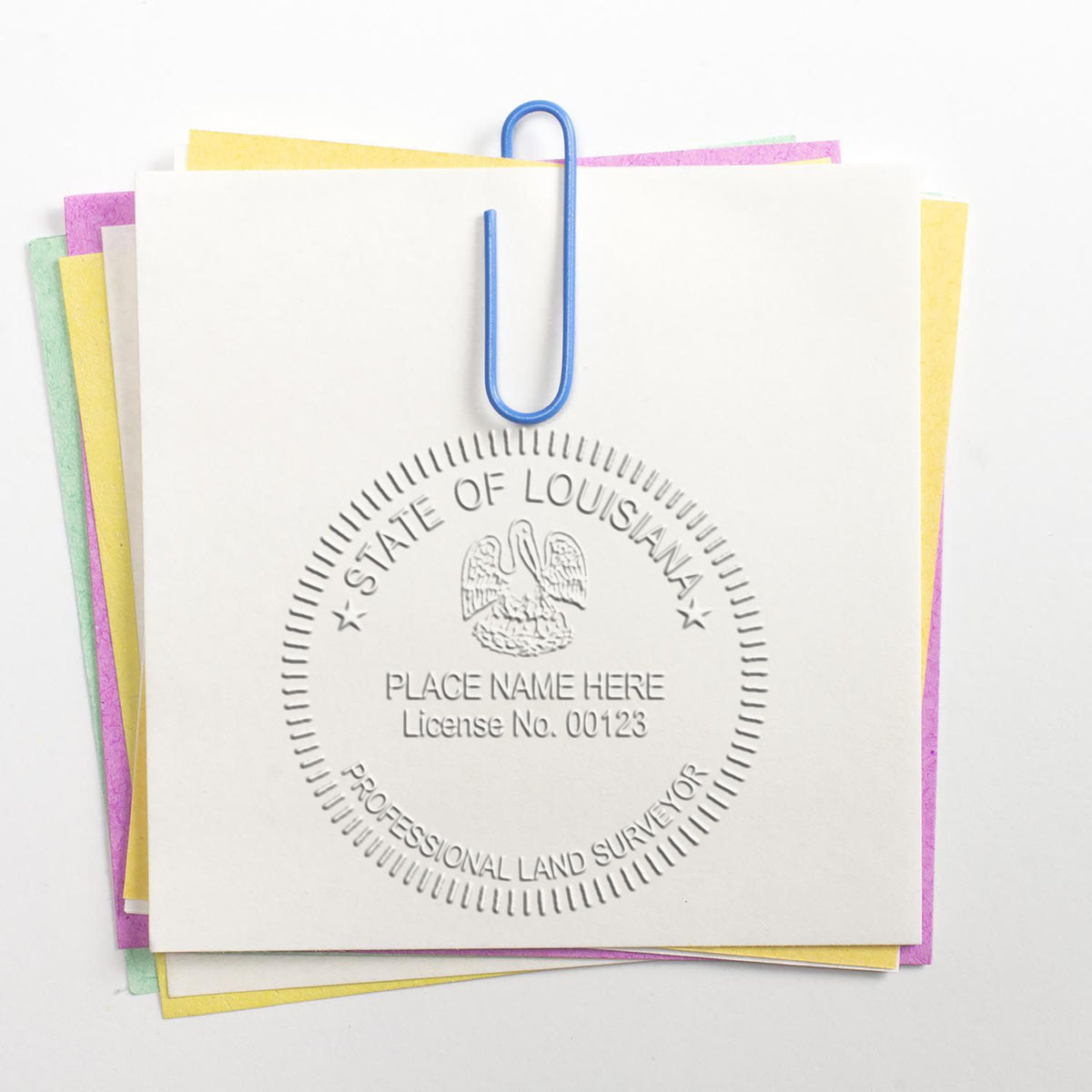 An in use photo of the Gift Louisiana Land Surveyor Seal showing a sample imprint on a cardstock