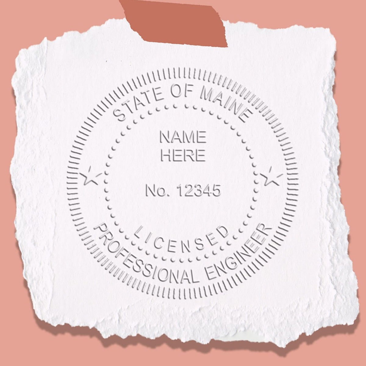 An alternative view of the Heavy Duty Cast Iron Maine Engineer Seal Embosser stamped on a sheet of paper showing the image in use