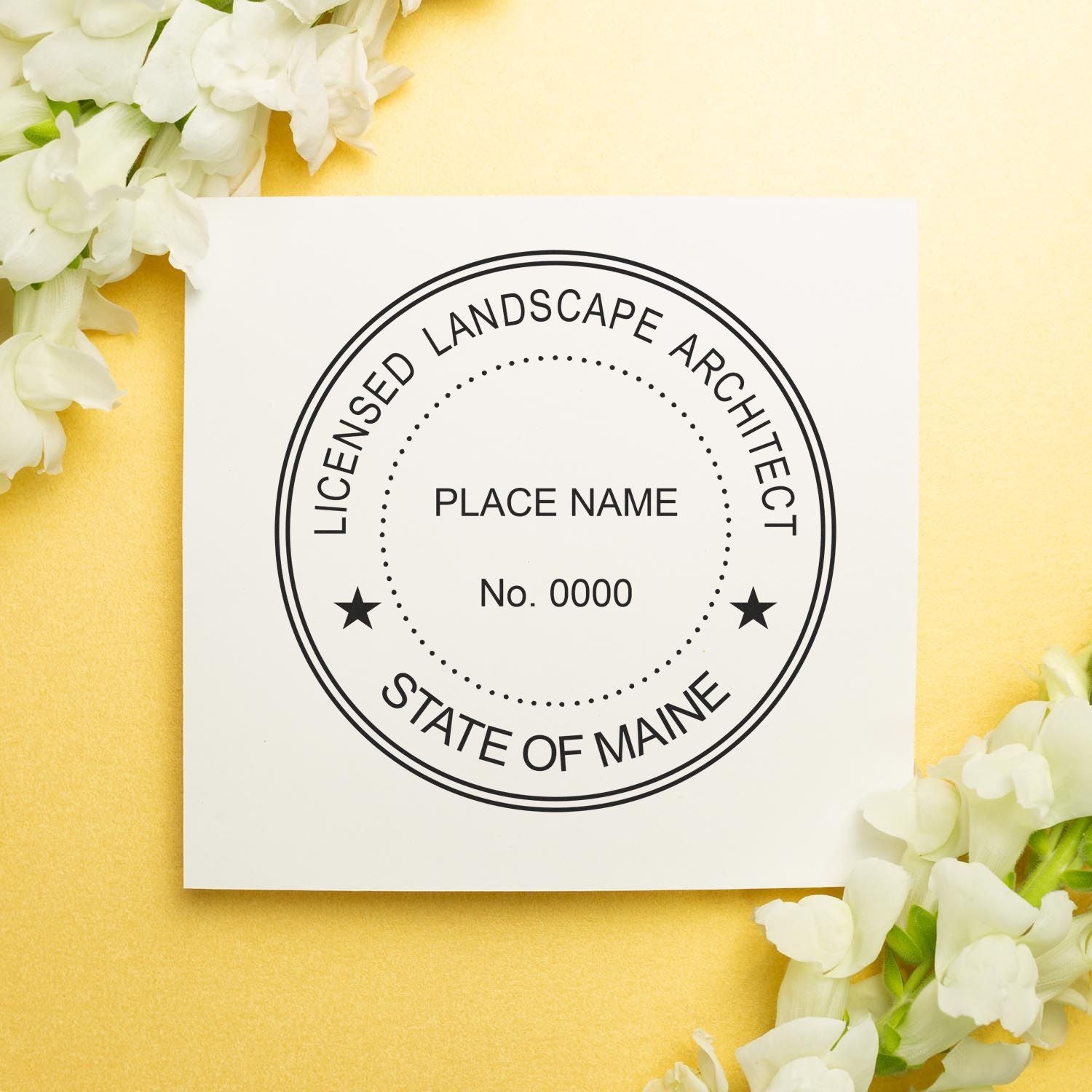 This paper is stamped with a sample imprint of the Slim Pre-Inked Maine Landscape Architect Seal Stamp, signifying its quality and reliability.