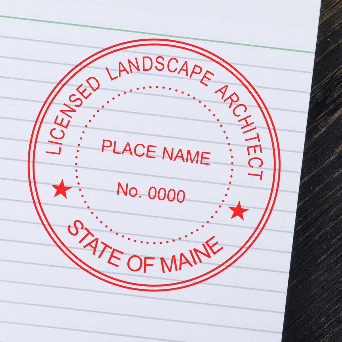An alternative view of the Premium MaxLight Pre-Inked Maine Landscape Architectural Stamp stamped on a sheet of paper showing the image in use