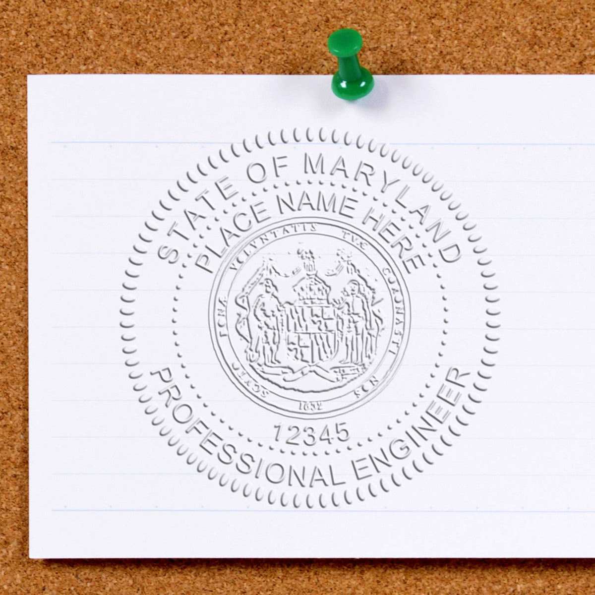 An in use photo of the Gift Maryland Engineer Seal showing a sample imprint on a cardstock