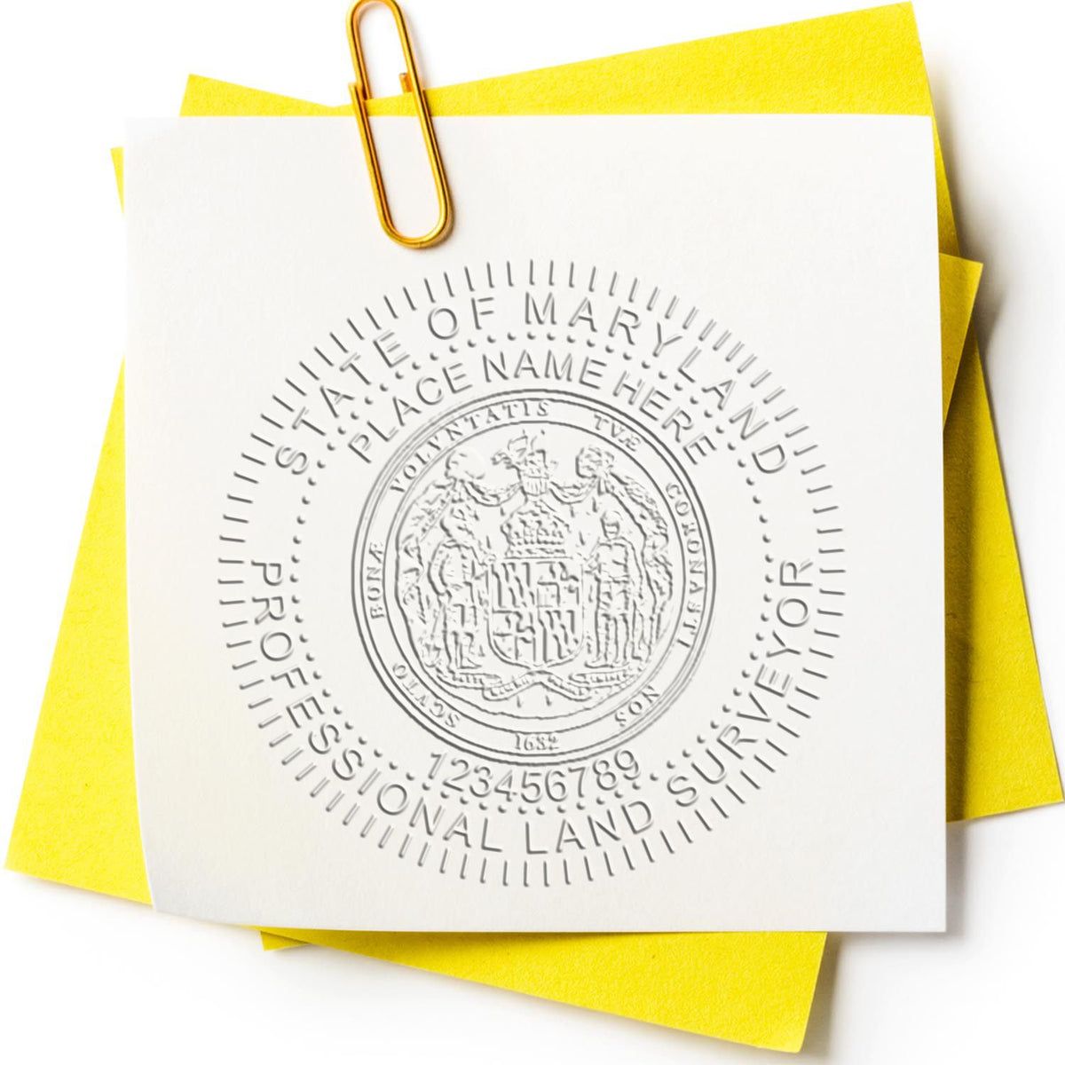 A lifestyle photo showing a stamped image of the State of Maryland Soft Land Surveyor Embossing Seal on a piece of paper