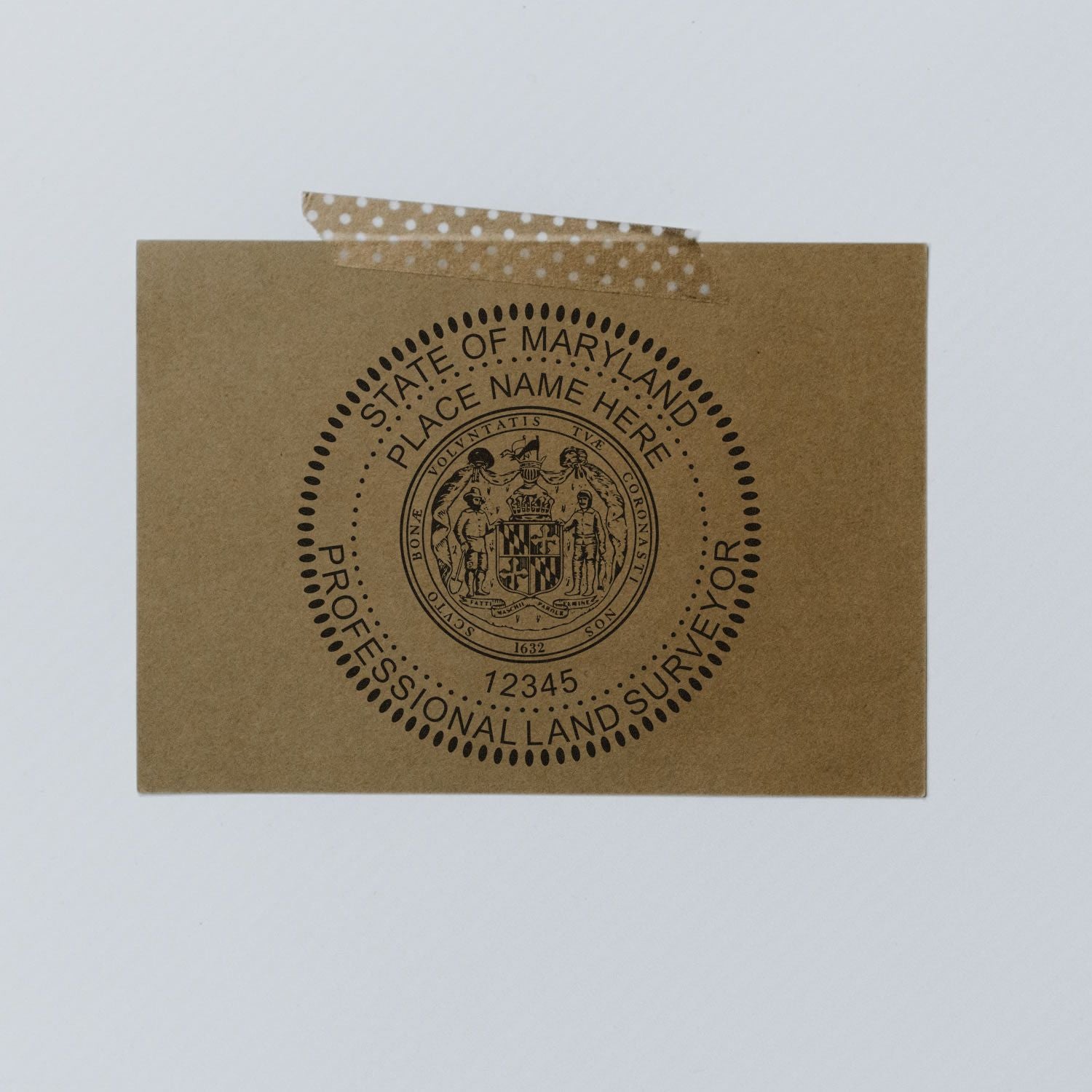 Premium MaxLight Pre-Inked Maryland Surveyors Stamp on brown paper, secured with polka dot tape, displaying professional land surveyor seal.