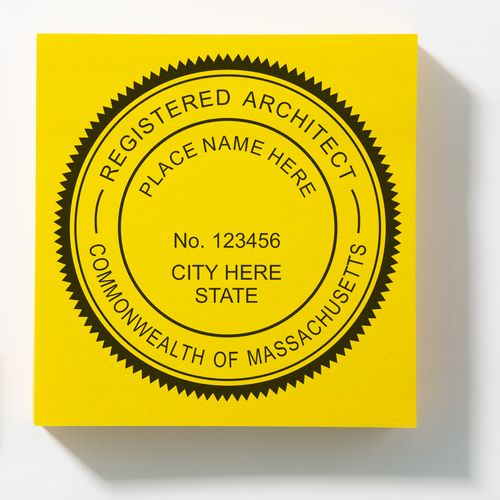 Premium MaxLight Pre-Inked Massachusetts Architectural Stamp on a yellow background, showing the seal for a registered architect in Massachusetts.