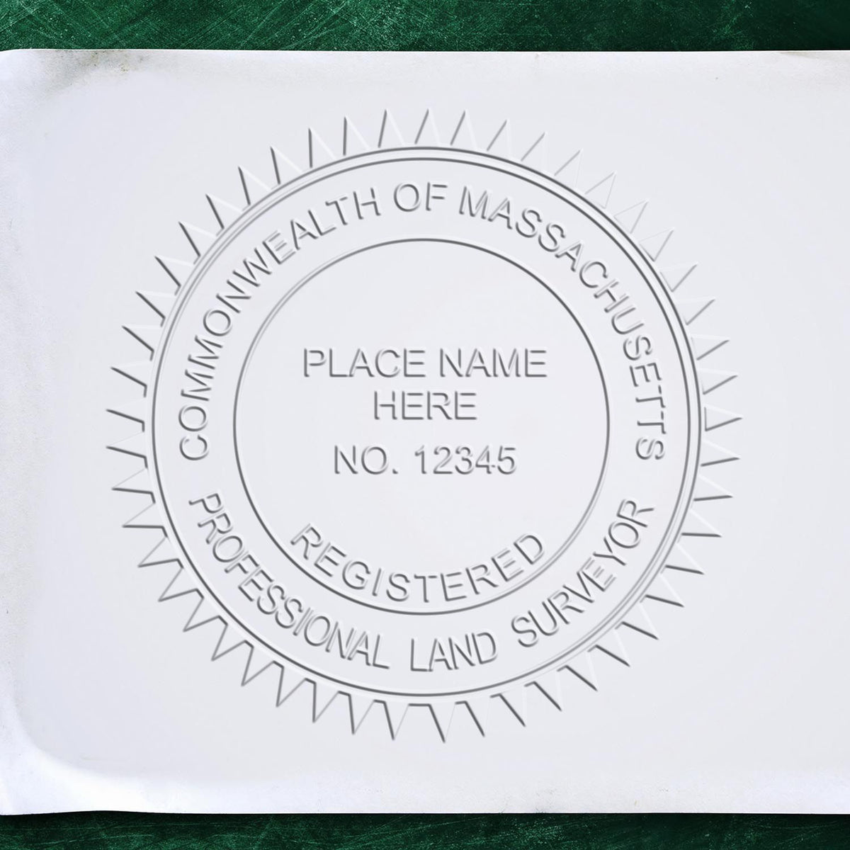 A lifestyle photo showing a stamped image of the State of Massachusetts Soft Land Surveyor Embossing Seal on a piece of paper