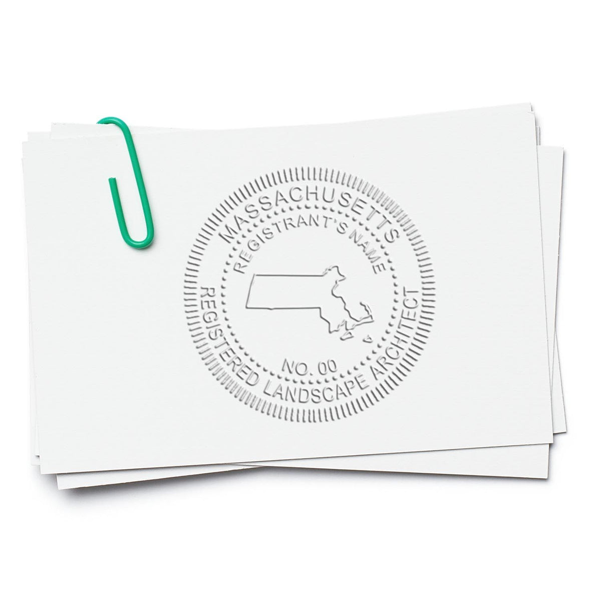 An in use photo of the Gift Massachusetts Landscape Architect Seal showing a sample imprint on a cardstock