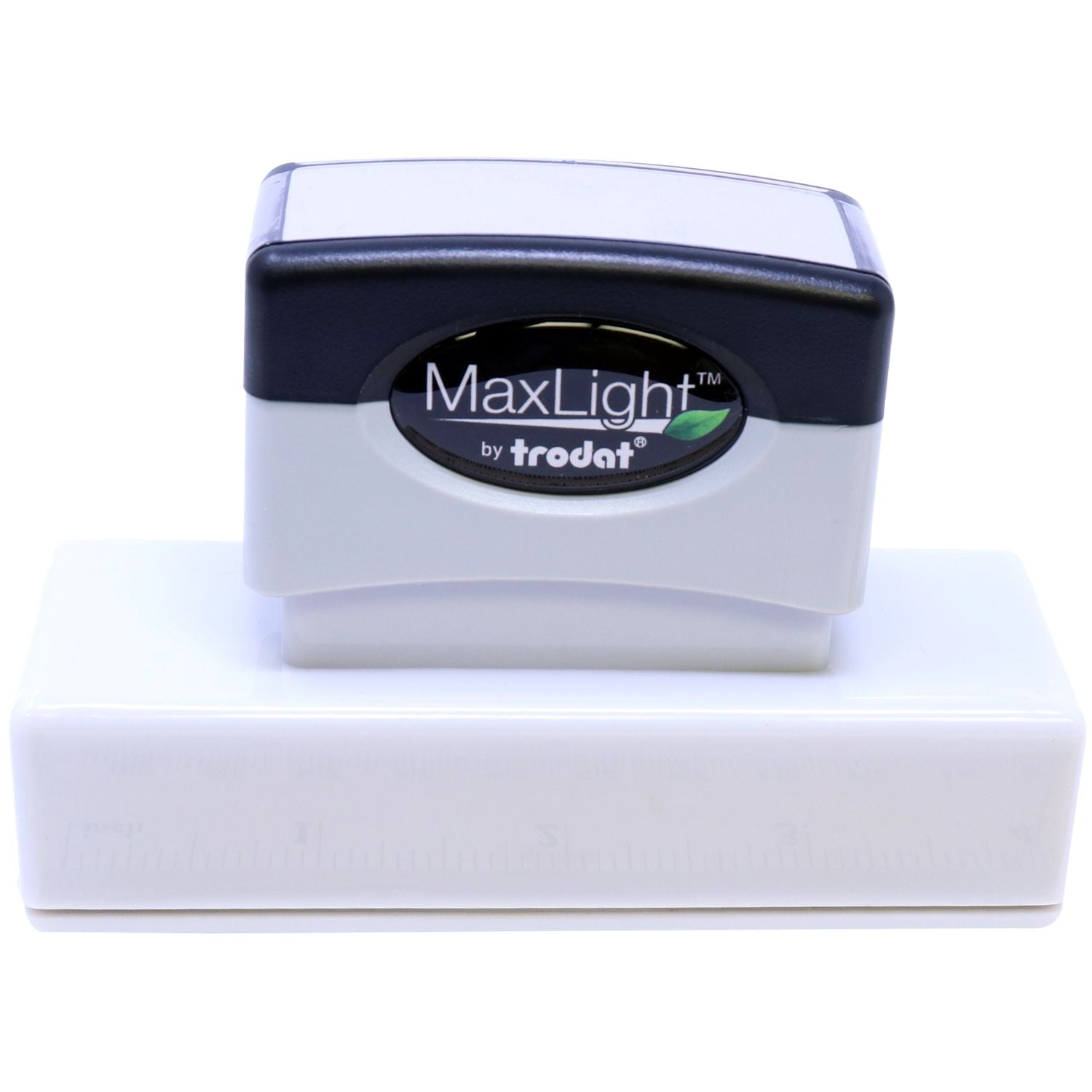 MaxLight Pre-Inked Stamp Identification Notary Stamp by Trodat, shown in black and white, resting on a white surface with a ruler.