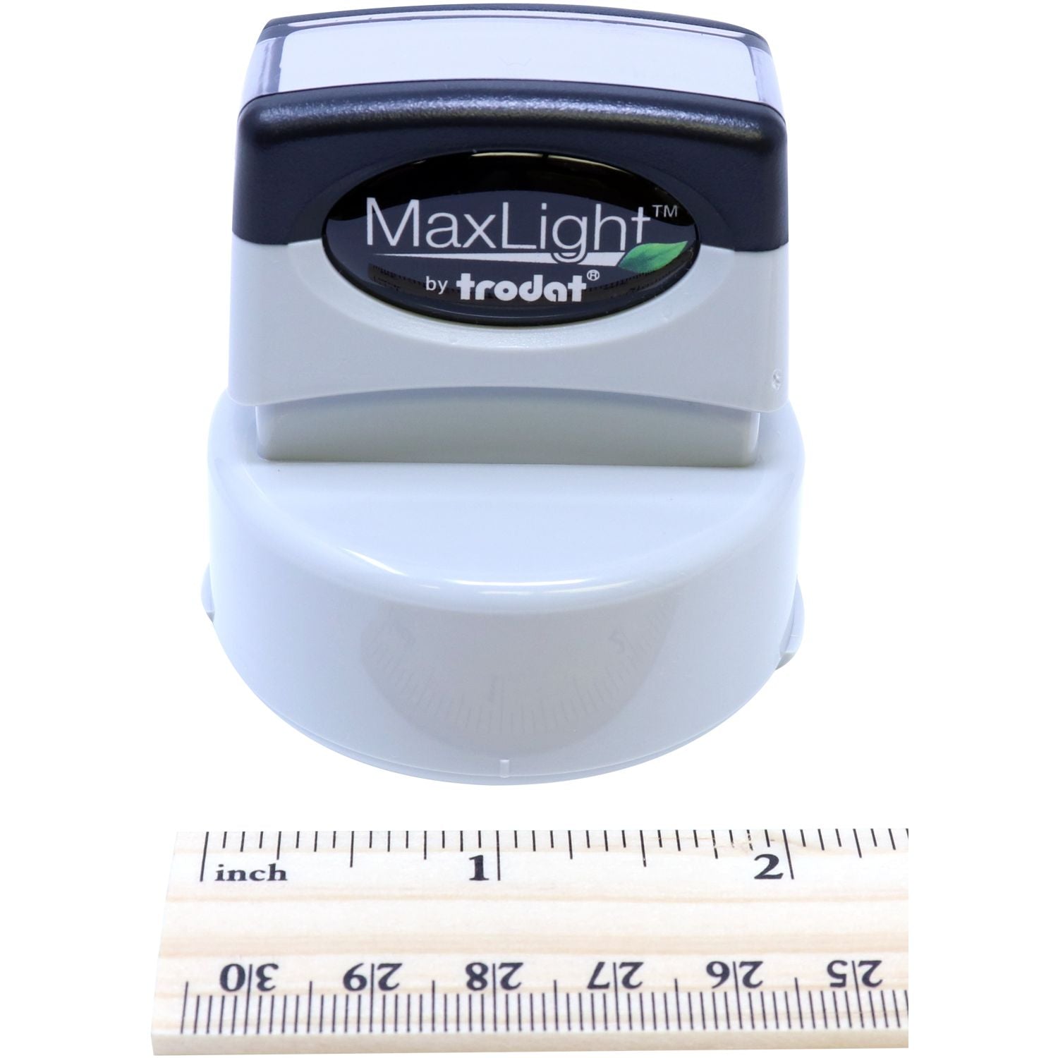 MaxLight XL2-535 Custom Pre-Inked Business Stamp 1-5/8 Diameter shown with a ruler for scale, highlighting its compact size.