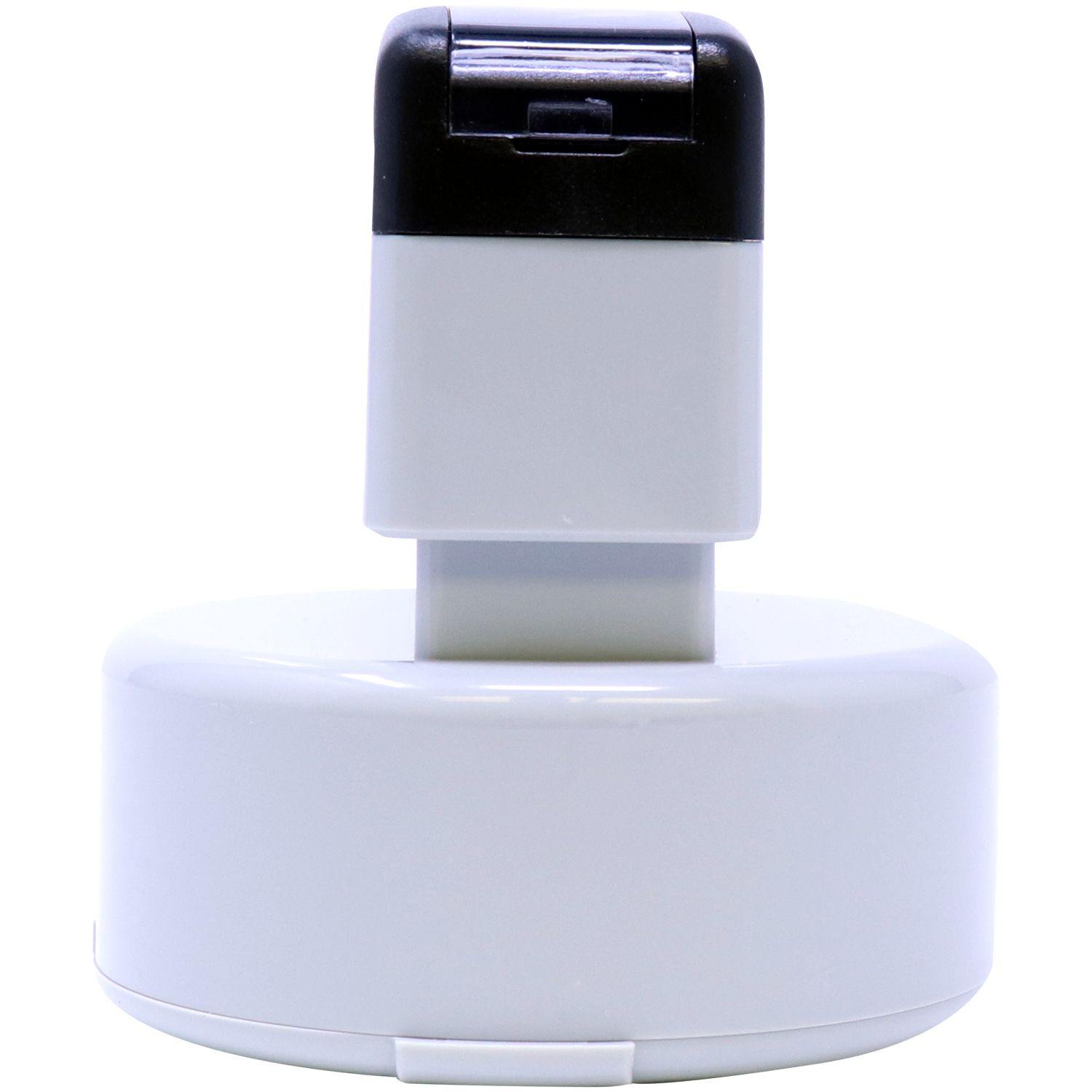 Forester MaxLight Pre Inked Rubber Stamp of Seal in white and black, side view, with a round base and a rectangular top.