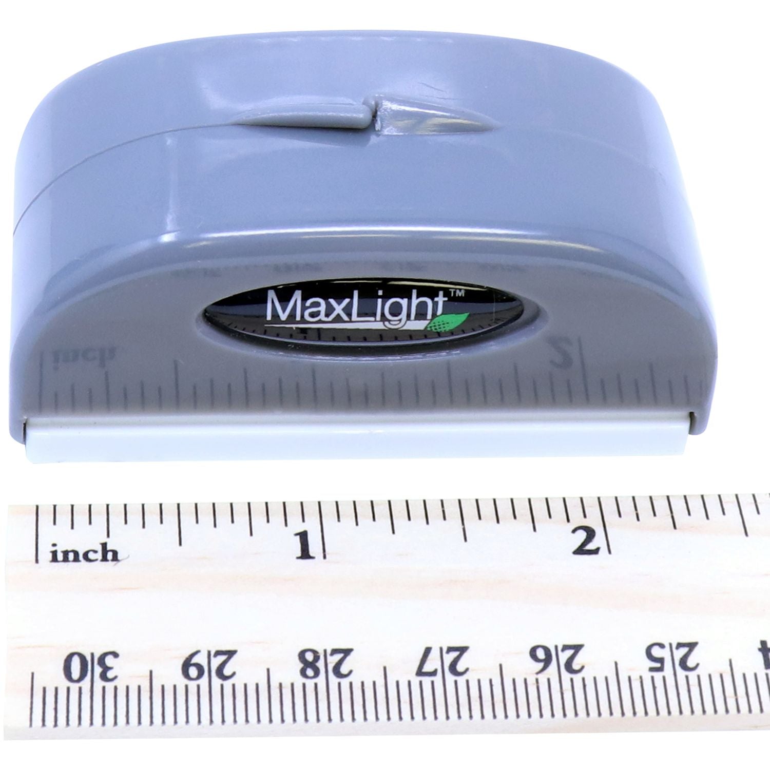 MaxLight XL2-42 Custom Pre-Inked Business Stamp 11/16 x 1-15/16 in gray, shown next to a ruler for size reference.