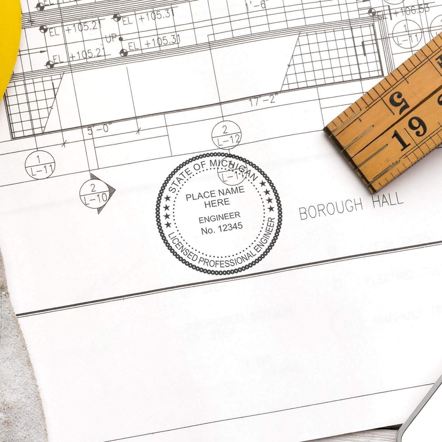 Another Example of a stamped impression of the Digital Michigan PE Stamp and Electronic Seal for Michigan Engineer on a piece of office paper.