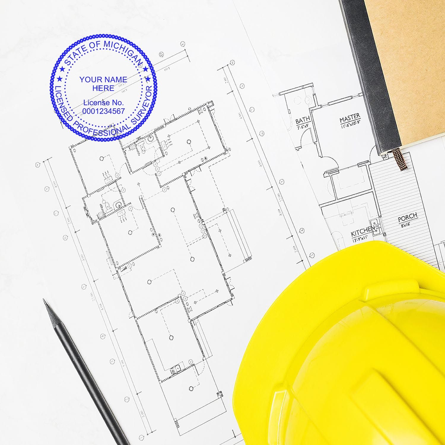 Premium MaxLight Pre-Inked Michigan Surveyors Stamp on architectural blueprint with a yellow hard hat and pen nearby.